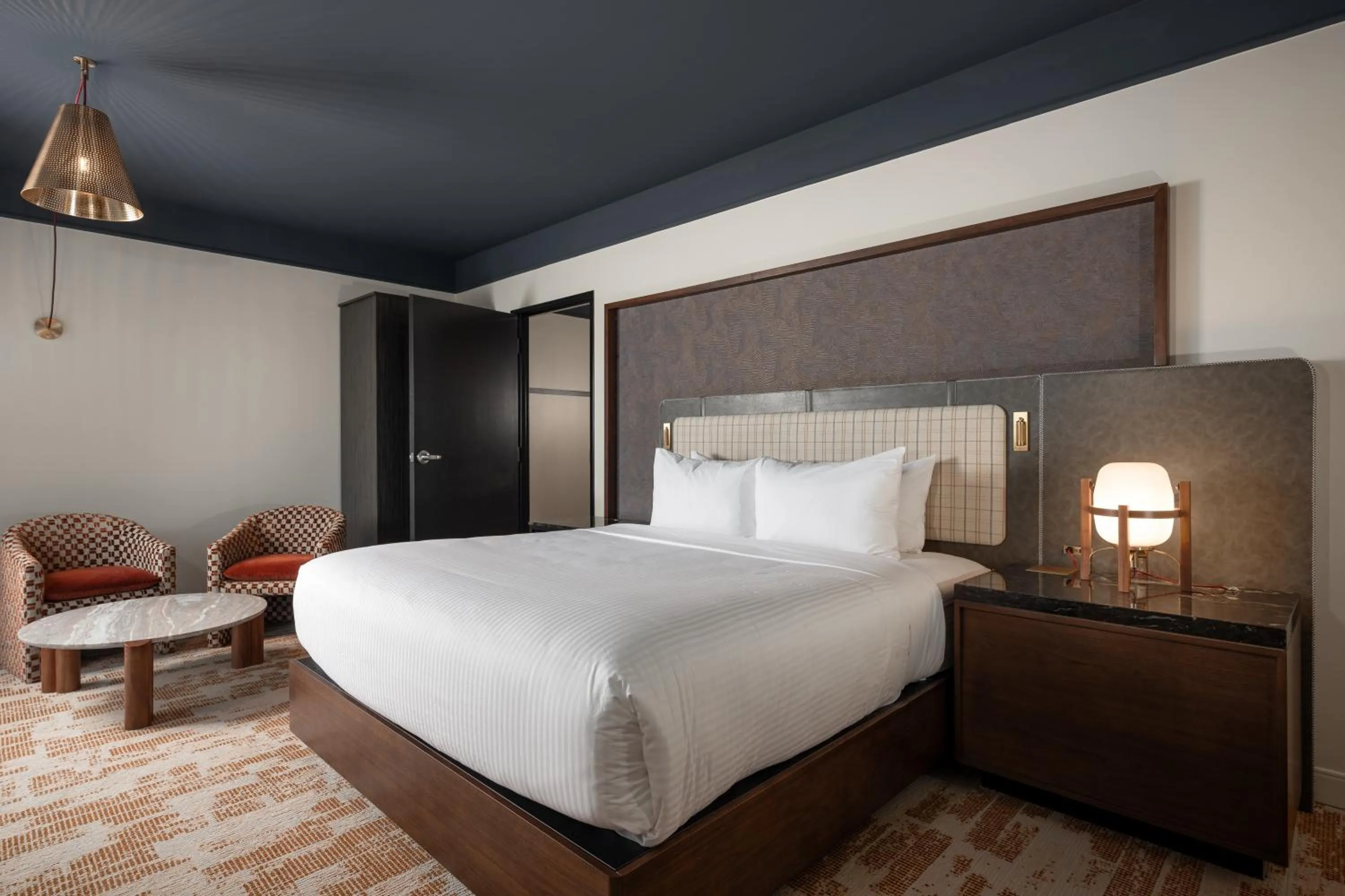Bed in The Elmore Hotel, DFW Southlake, a Tribute Portfolio Hotel