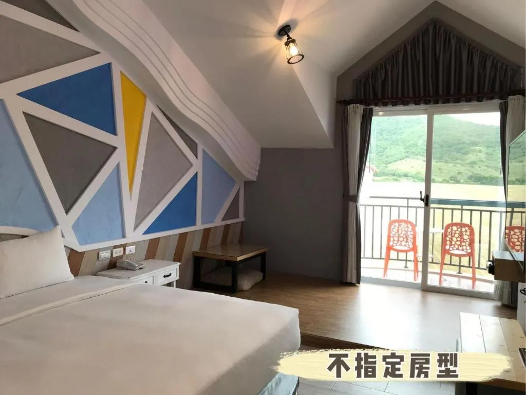 Photo of the whole room, Bed in Island on the Sea