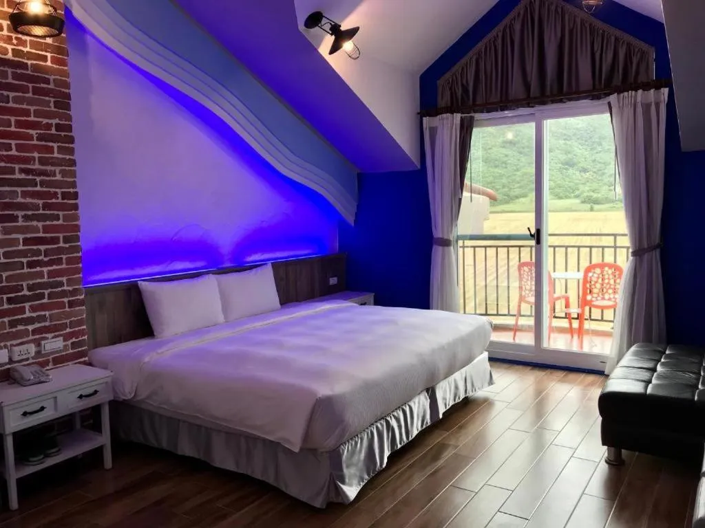 Photo of the whole room, Bed in Island on the Sea