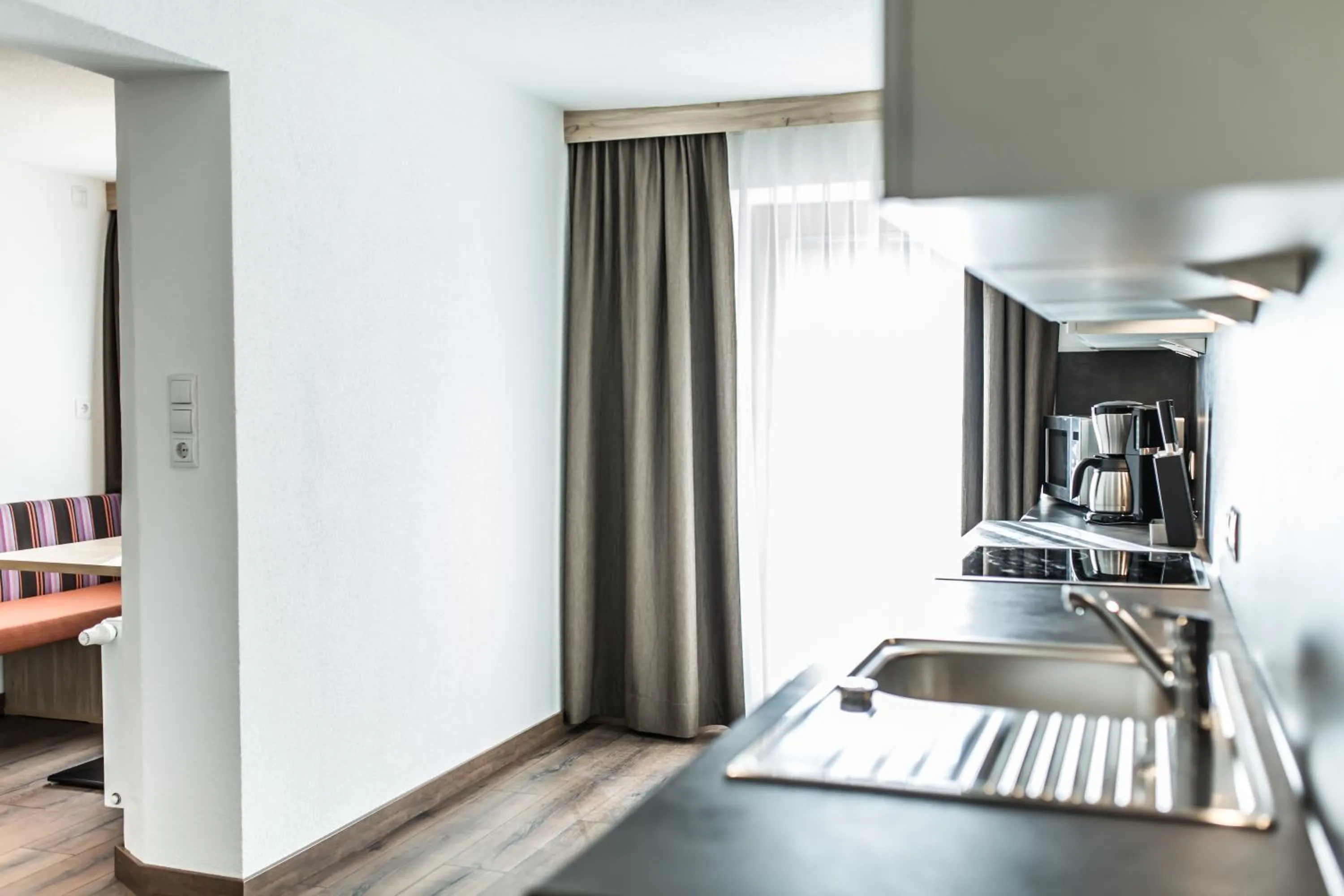 Kitchen or kitchenette in A Casa Smaragd Appartements