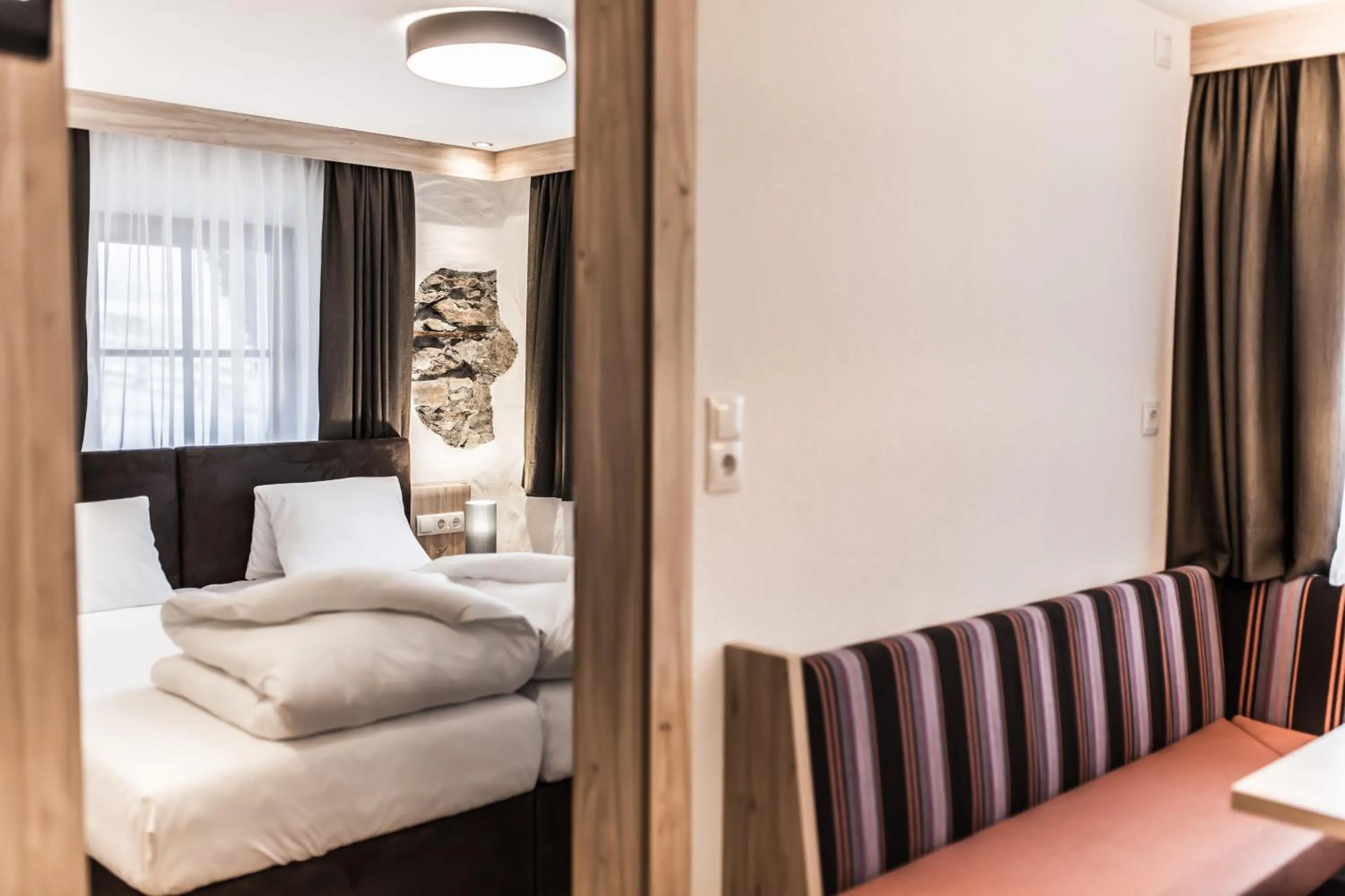 Seating area, Bed in A Casa Smaragd Appartements