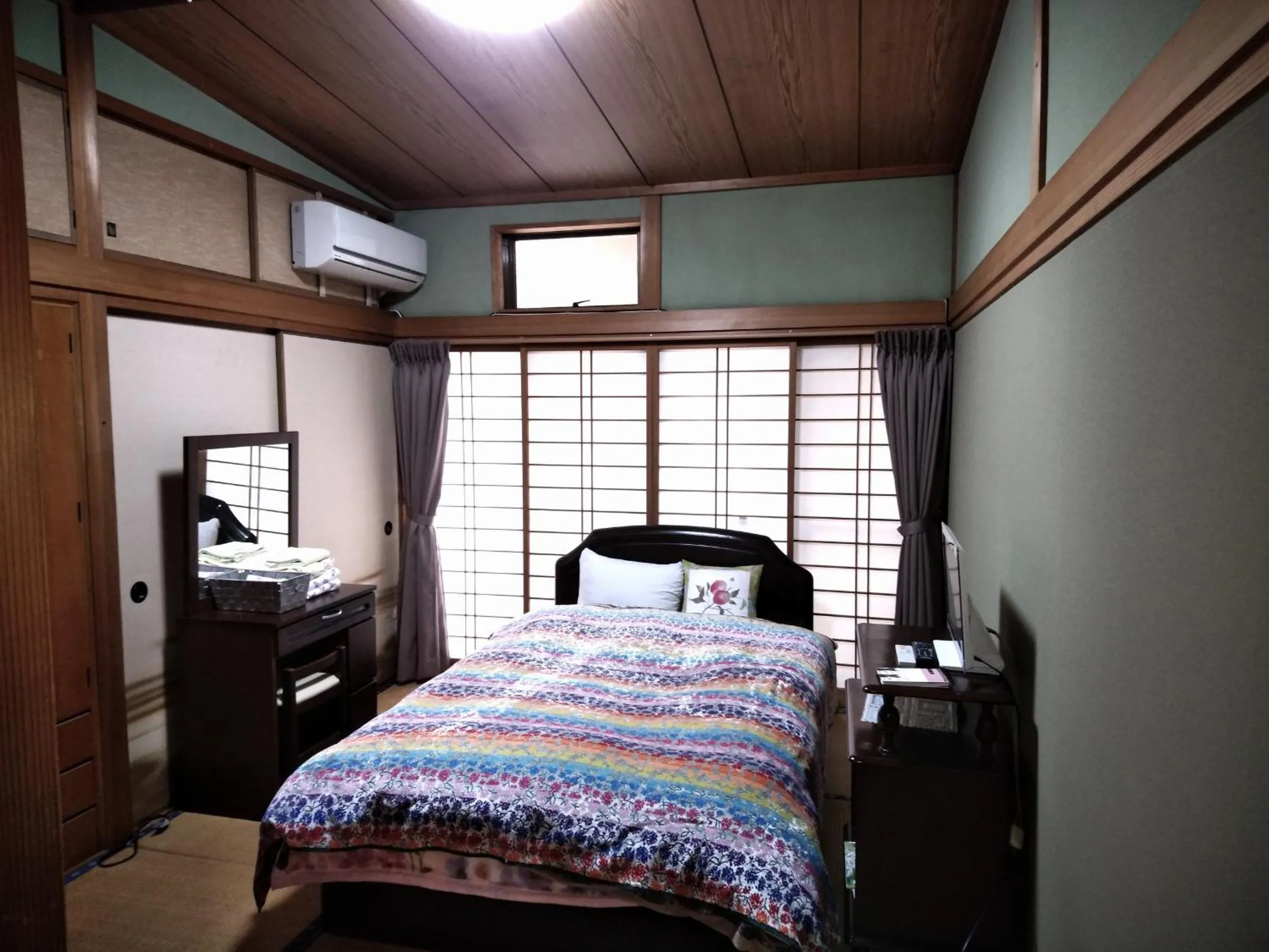Photo of the whole room, Bed in Hitoyoshi Morinohall Ladies in - Female Only