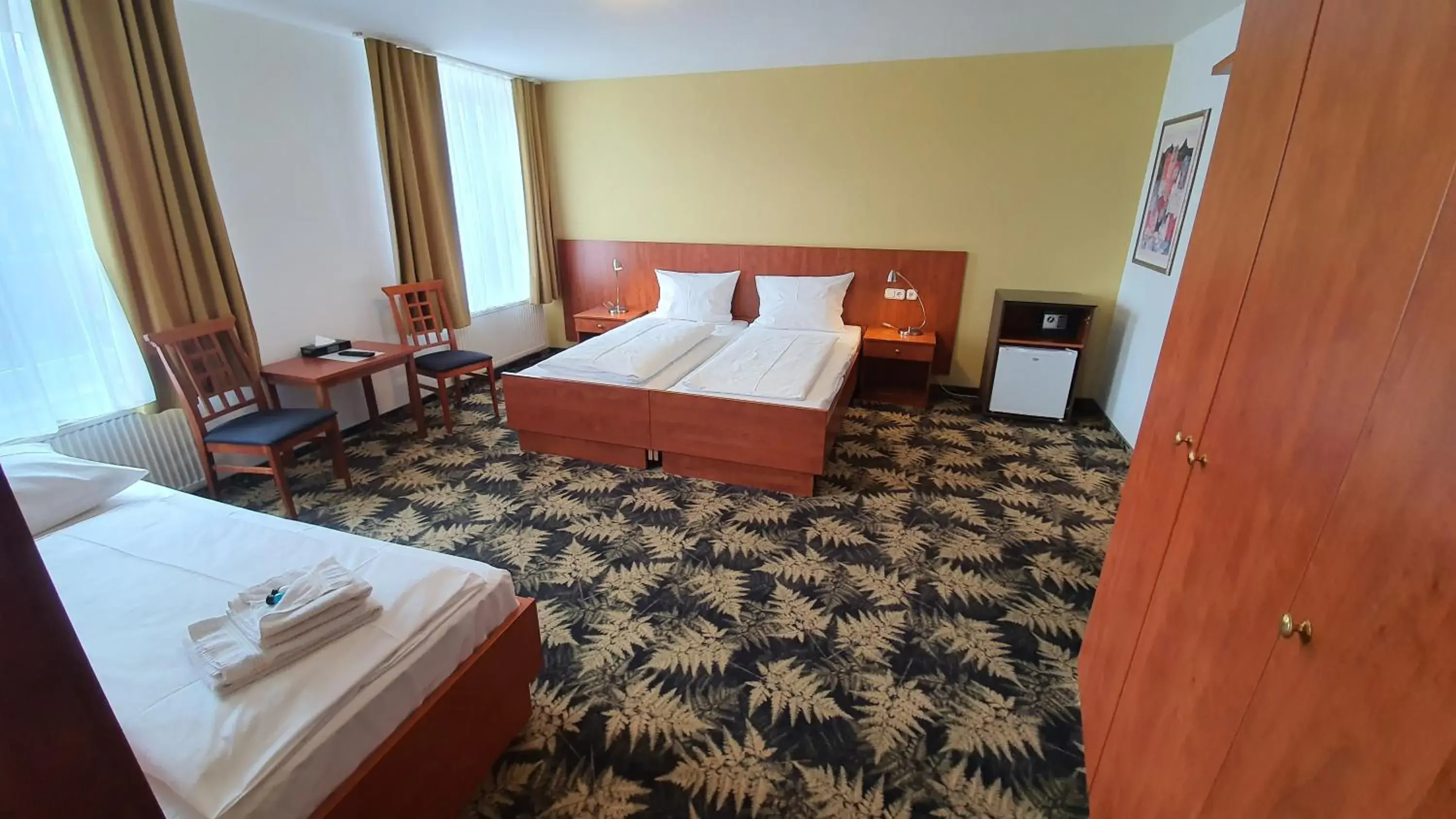 Bed in Hotel Der Tannenbaum Bed in Hotel Der Tannenbaum