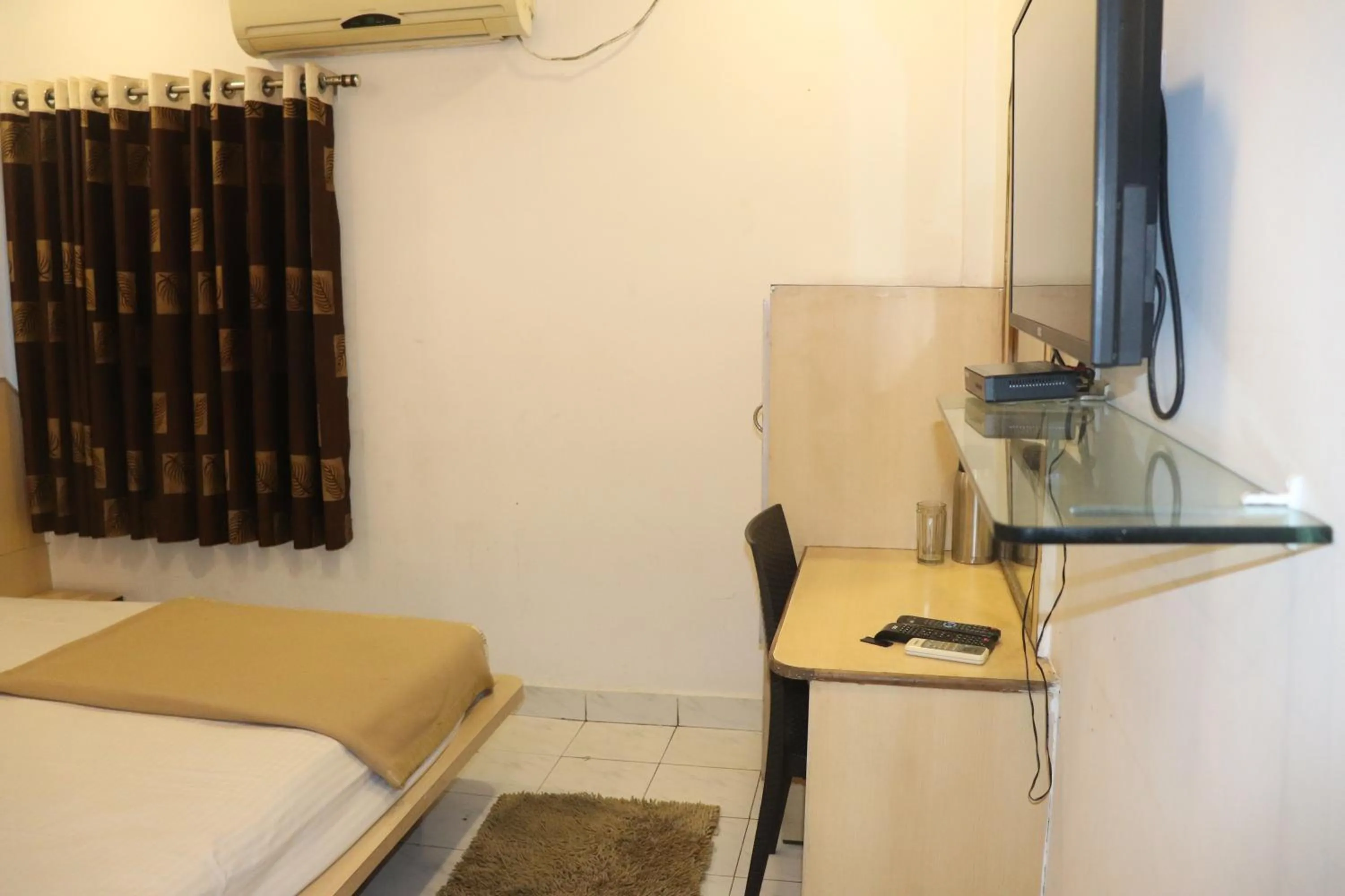 Photo of the whole room, Bed in Hotel Raj