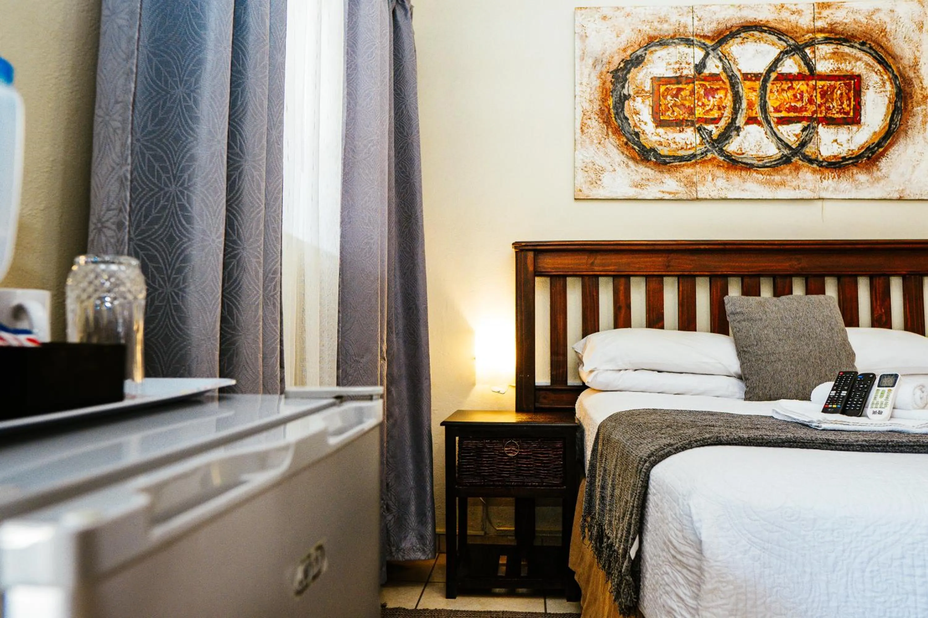 Bedroom, Bed in Ehrlichpark Lodge self catering and spa