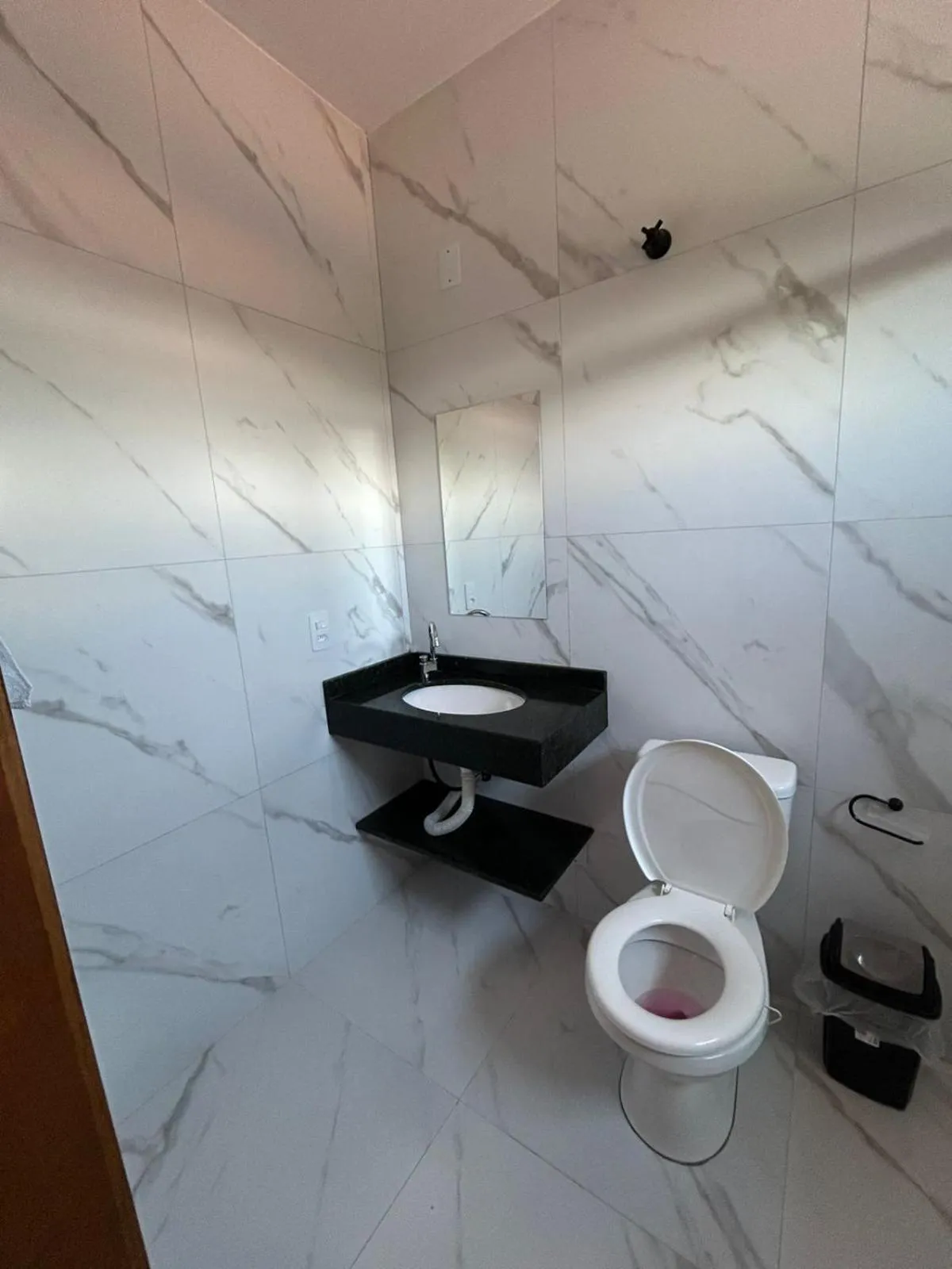 Toilet in Pousada casa da amizade