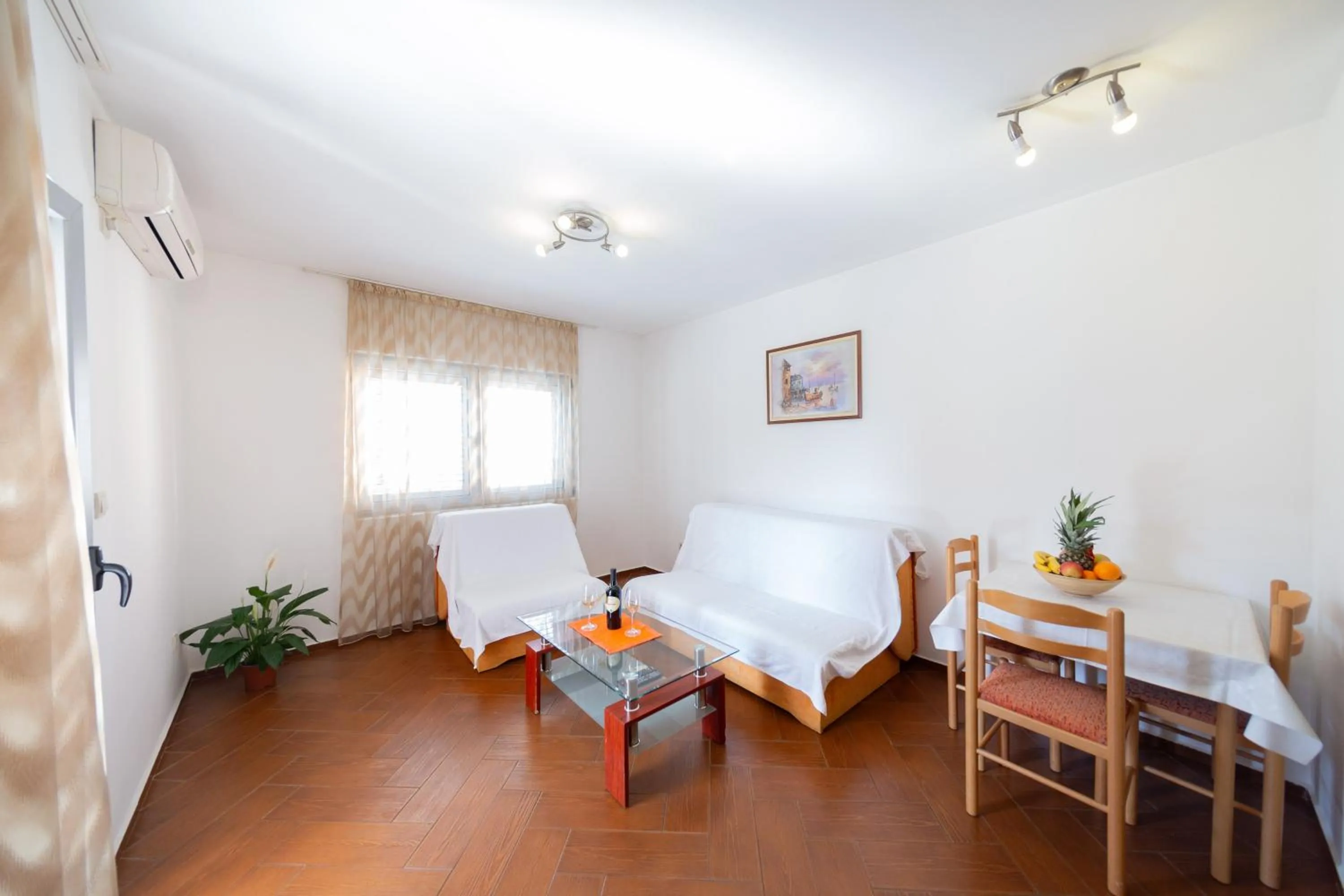 Living room, Bed in SMS Apartments