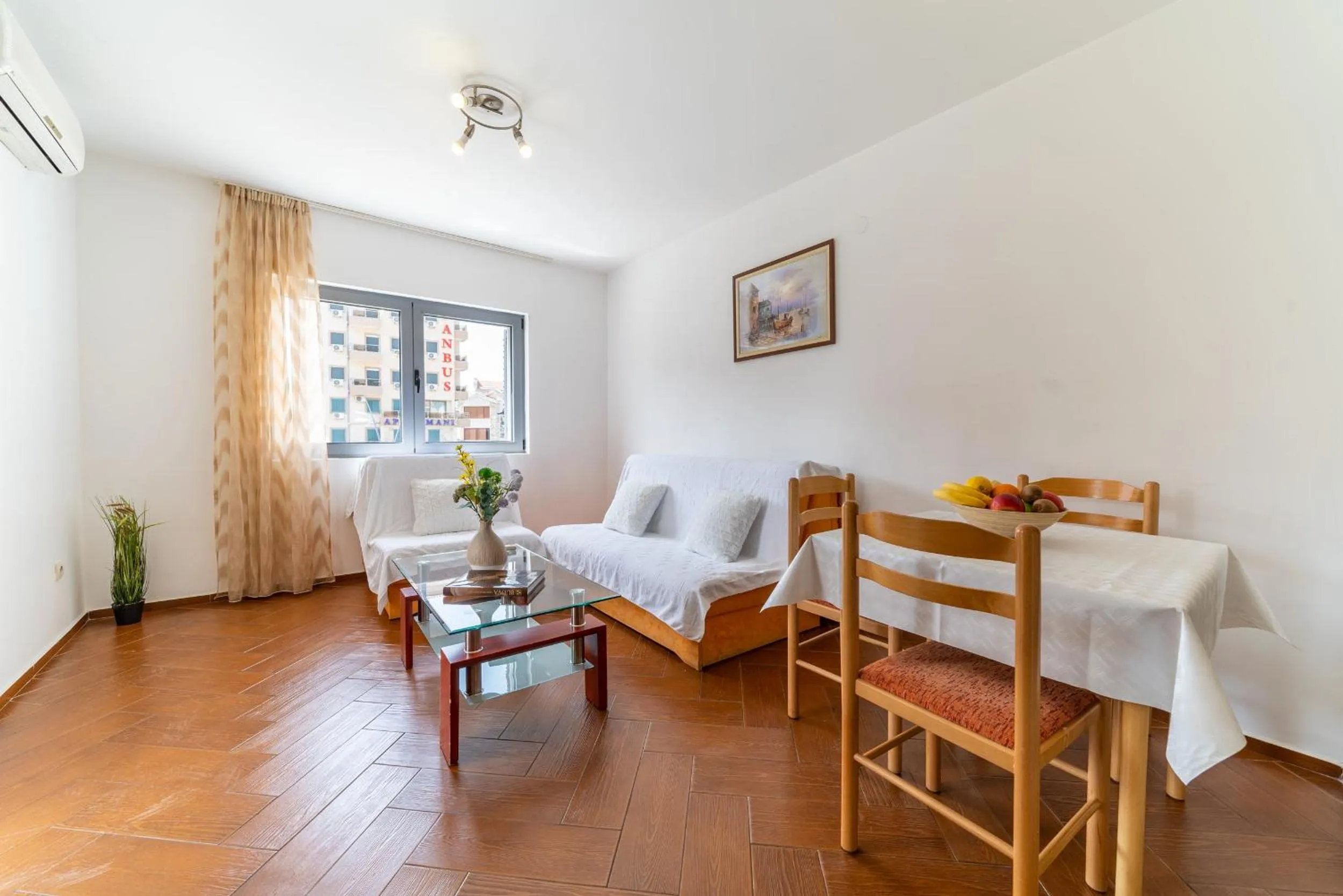 Living room, Bed in SMS Apartments