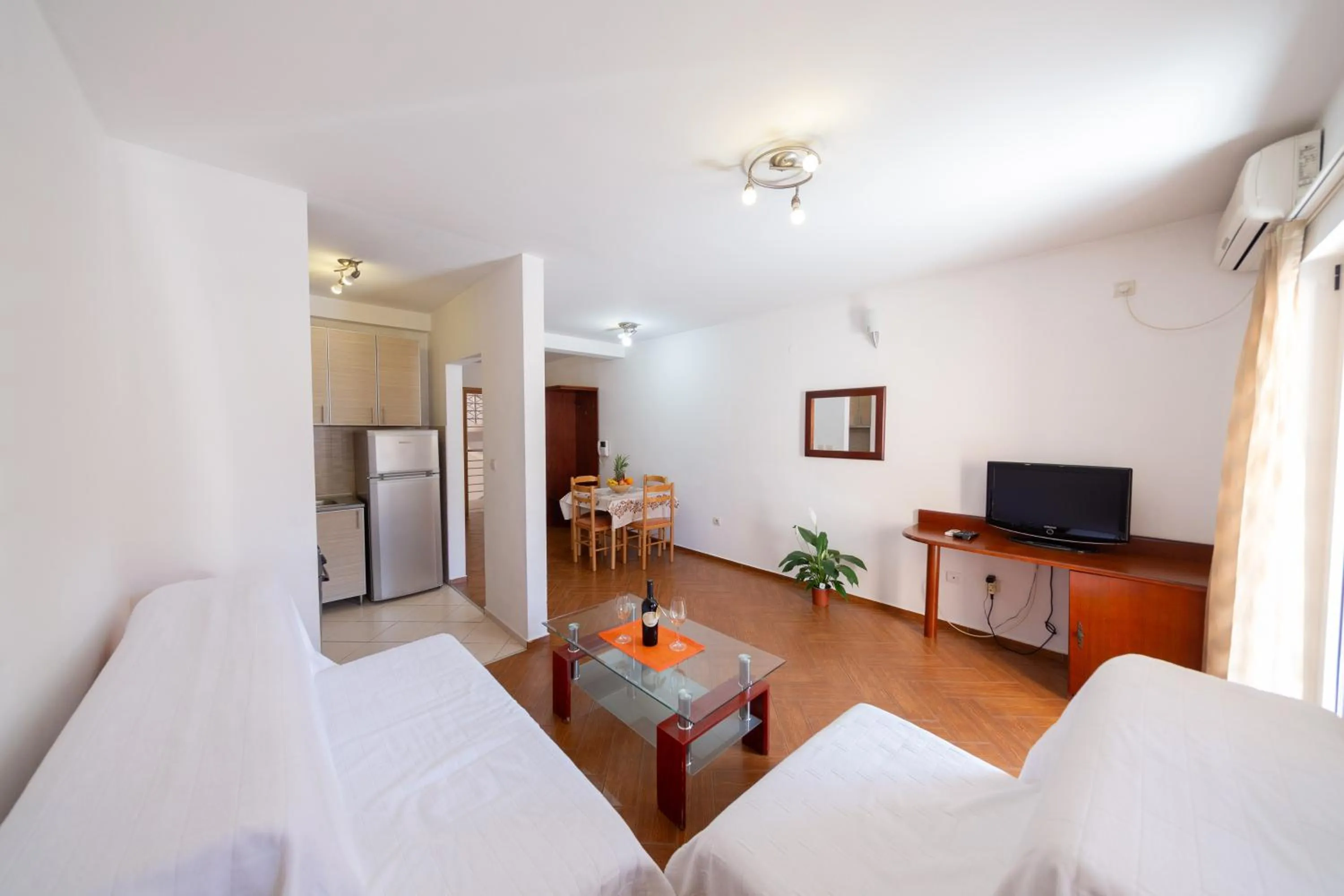 Living room, Bed in SMS Apartments