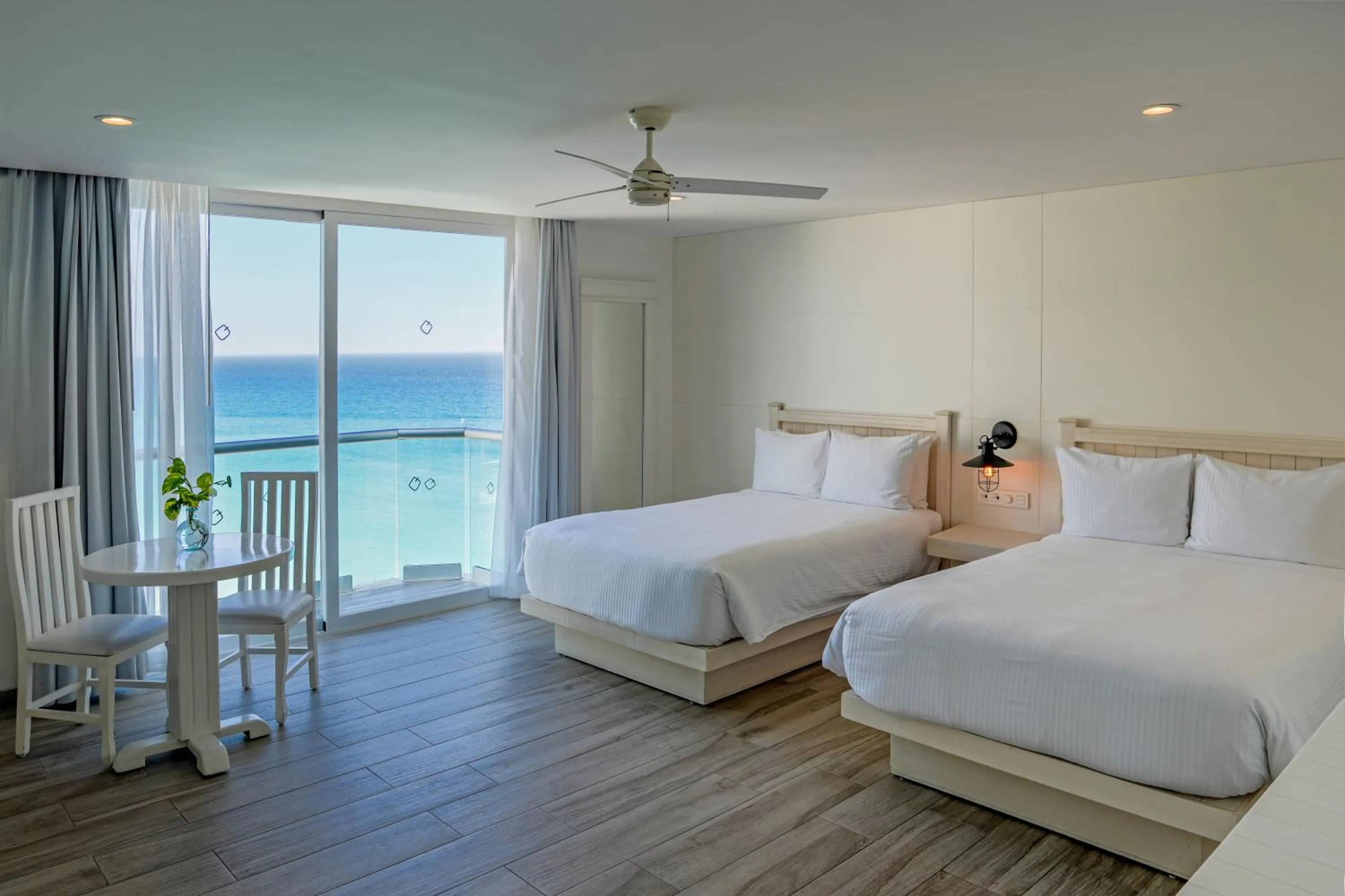 Photo of the whole room, Bed in Oleo Cancun Playa All Inclusive Resort