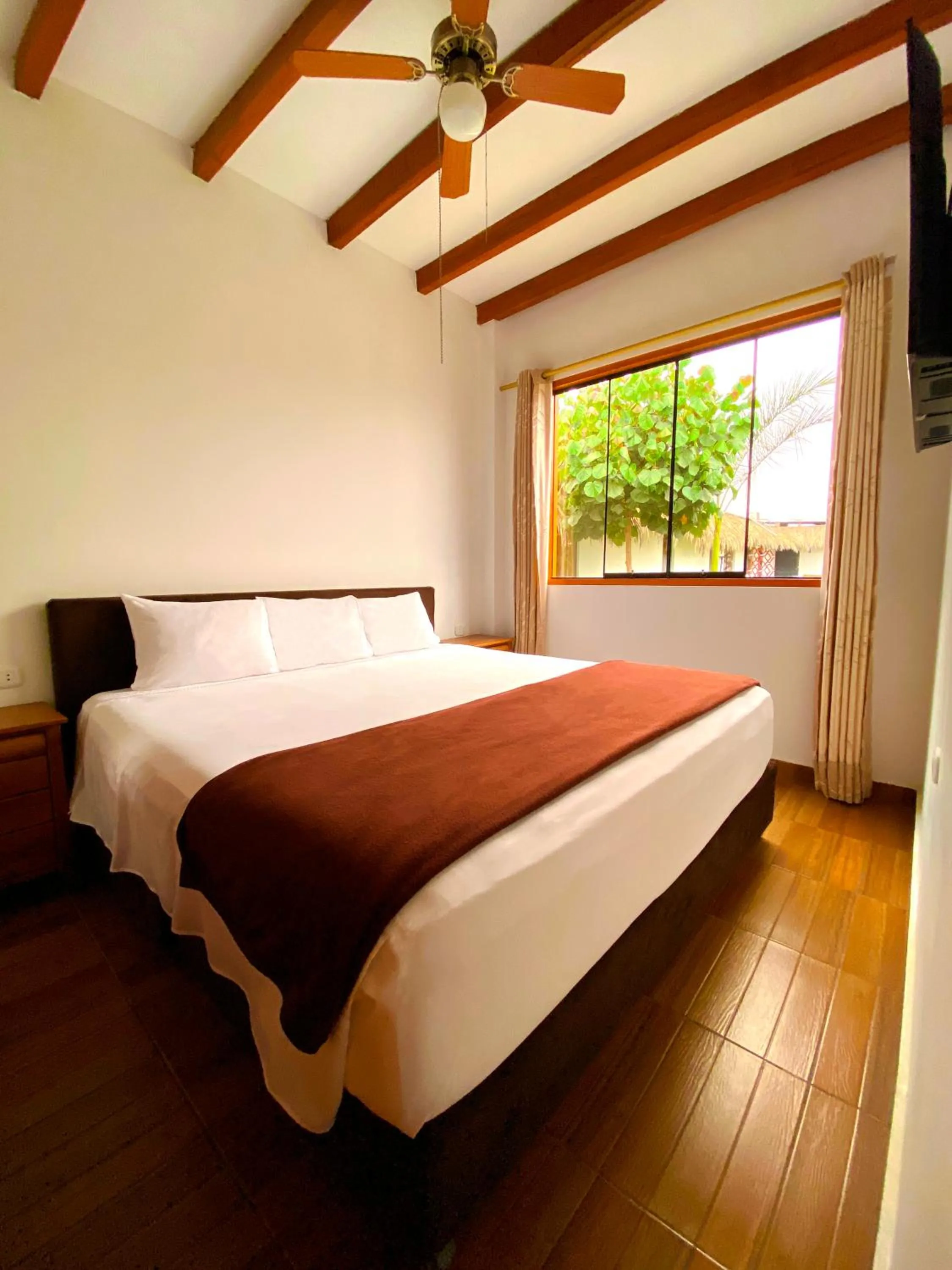 Bed in Hotel Resort Thiago