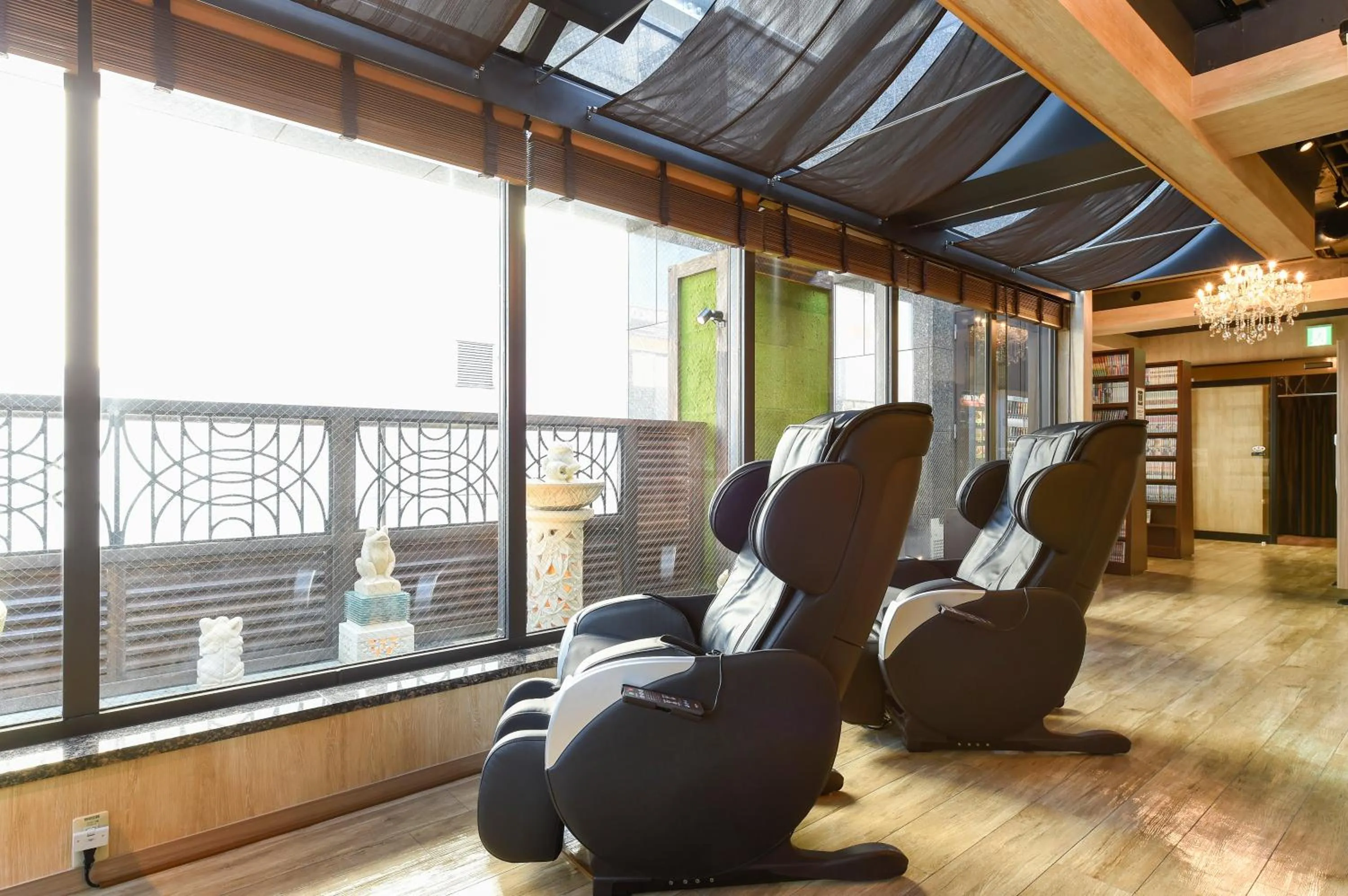 Communal lounge/ TV room in Anshin oyado woman Tokyo Ginza shiodome - Women Only