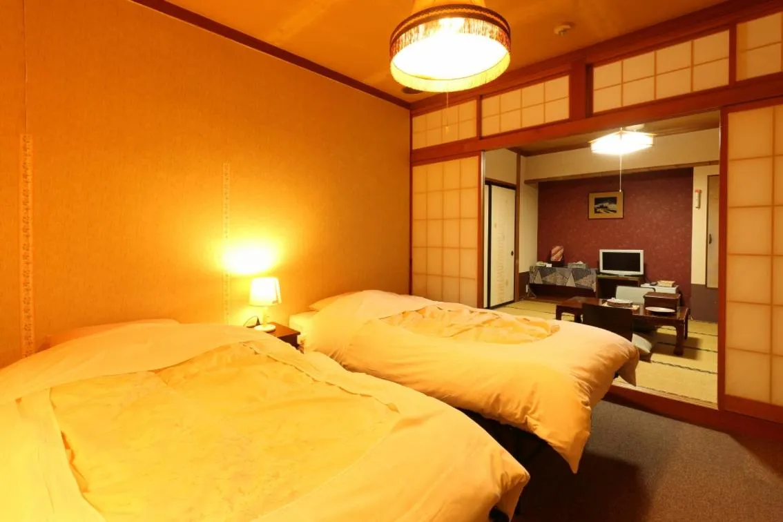 Bed in Dai Onsen Matsudaya Ryokan