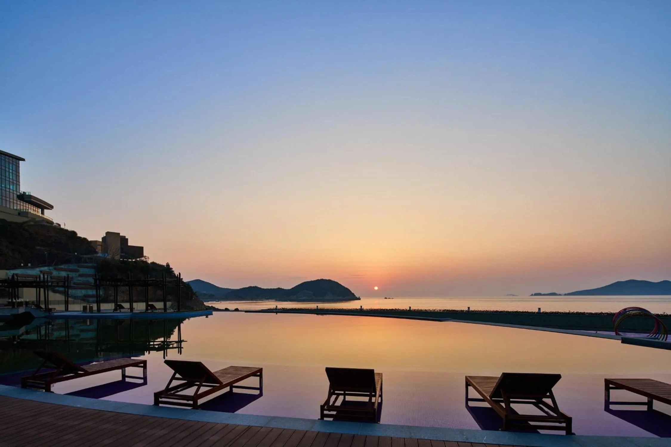 Swimming pool in Crowne Plaza Ningbo Xiangshan Sea View by IHG