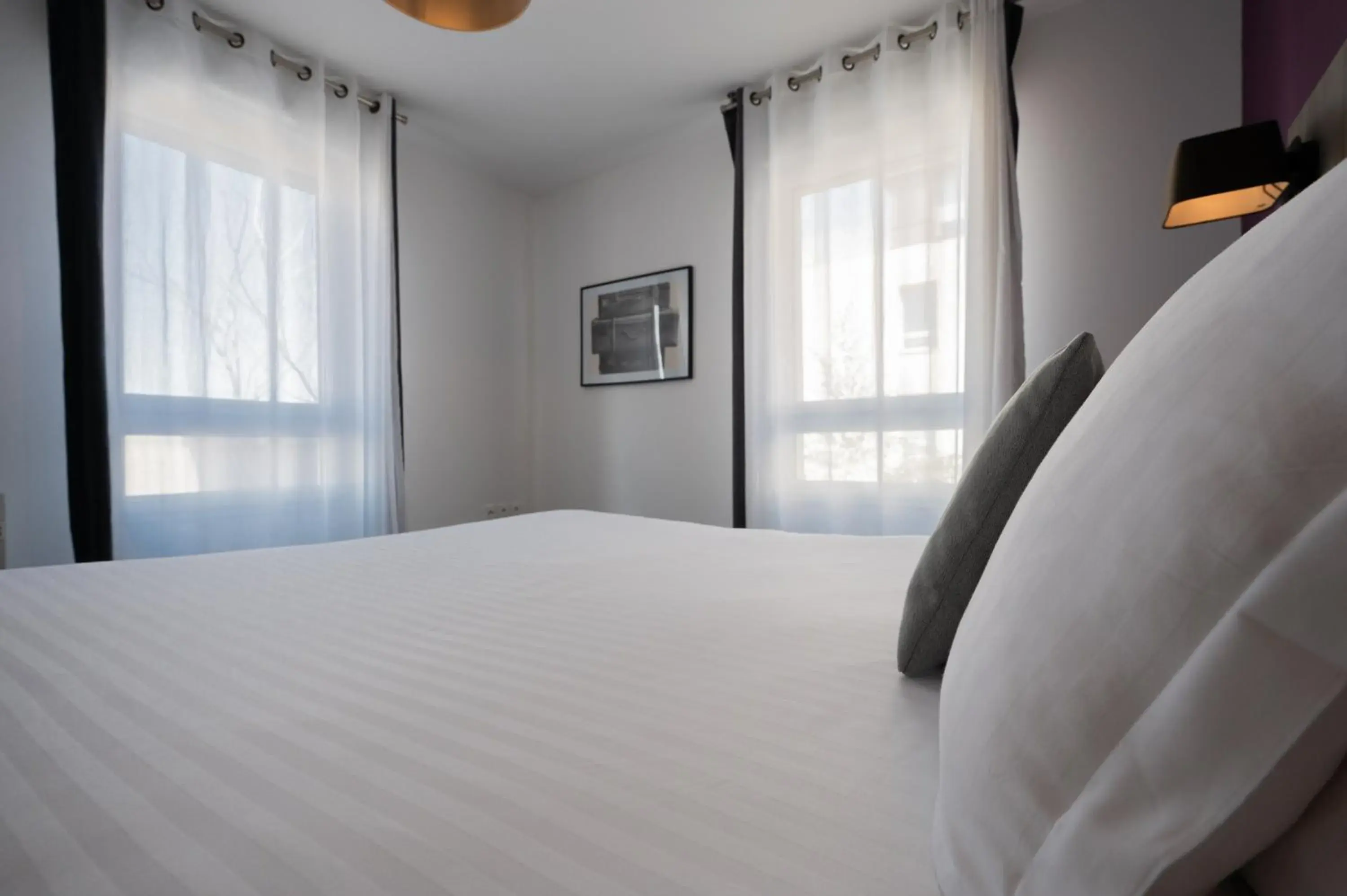 Bedroom, Bed in Nemea Appart Hotel Quai Victor Tours Centre Bedroom, Bed in Nemea Appart Hotel Quai Victor Tours Centre