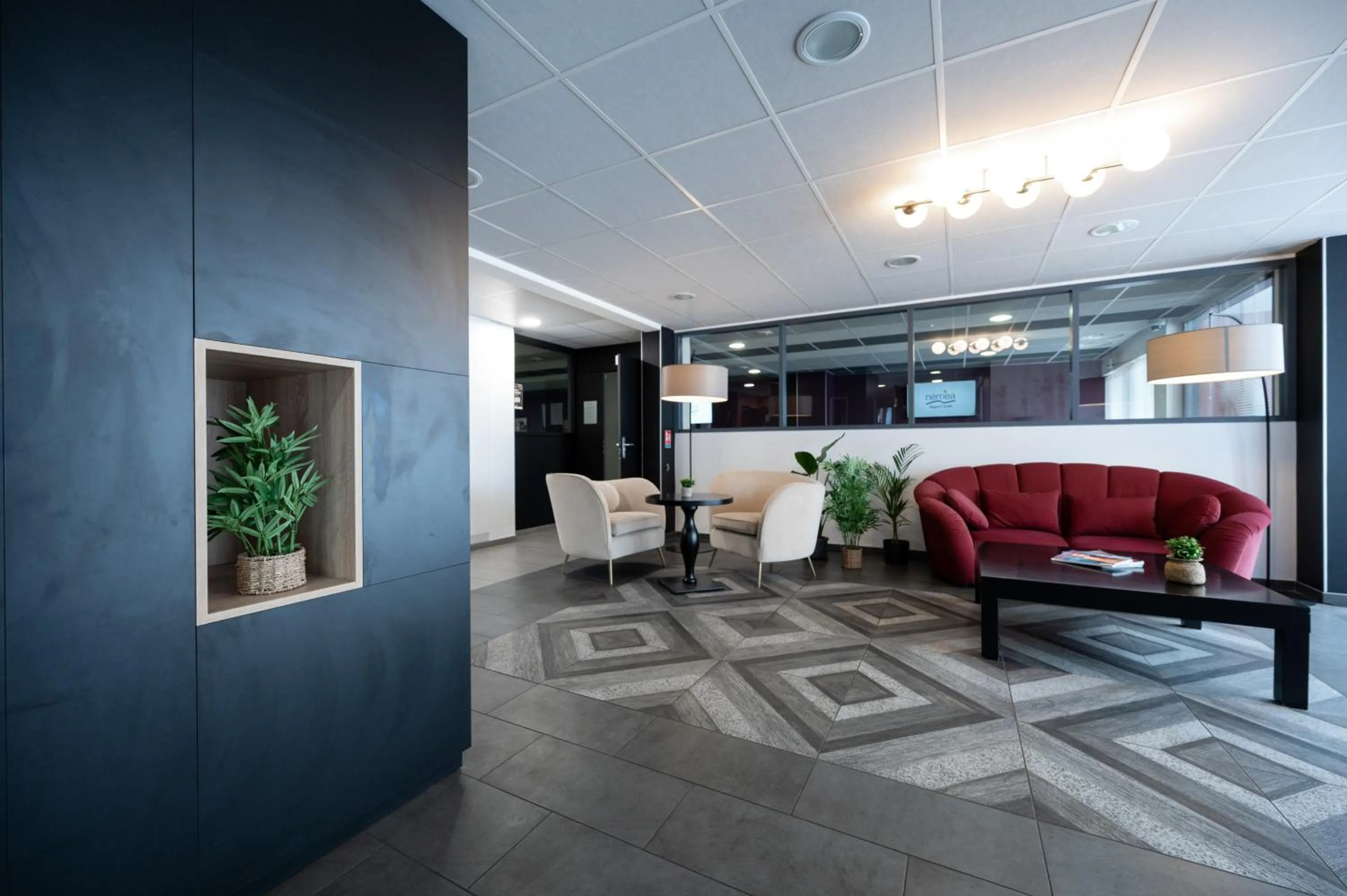Lobby or reception in Nemea Appart Hotel Quai Victor Tours Centre