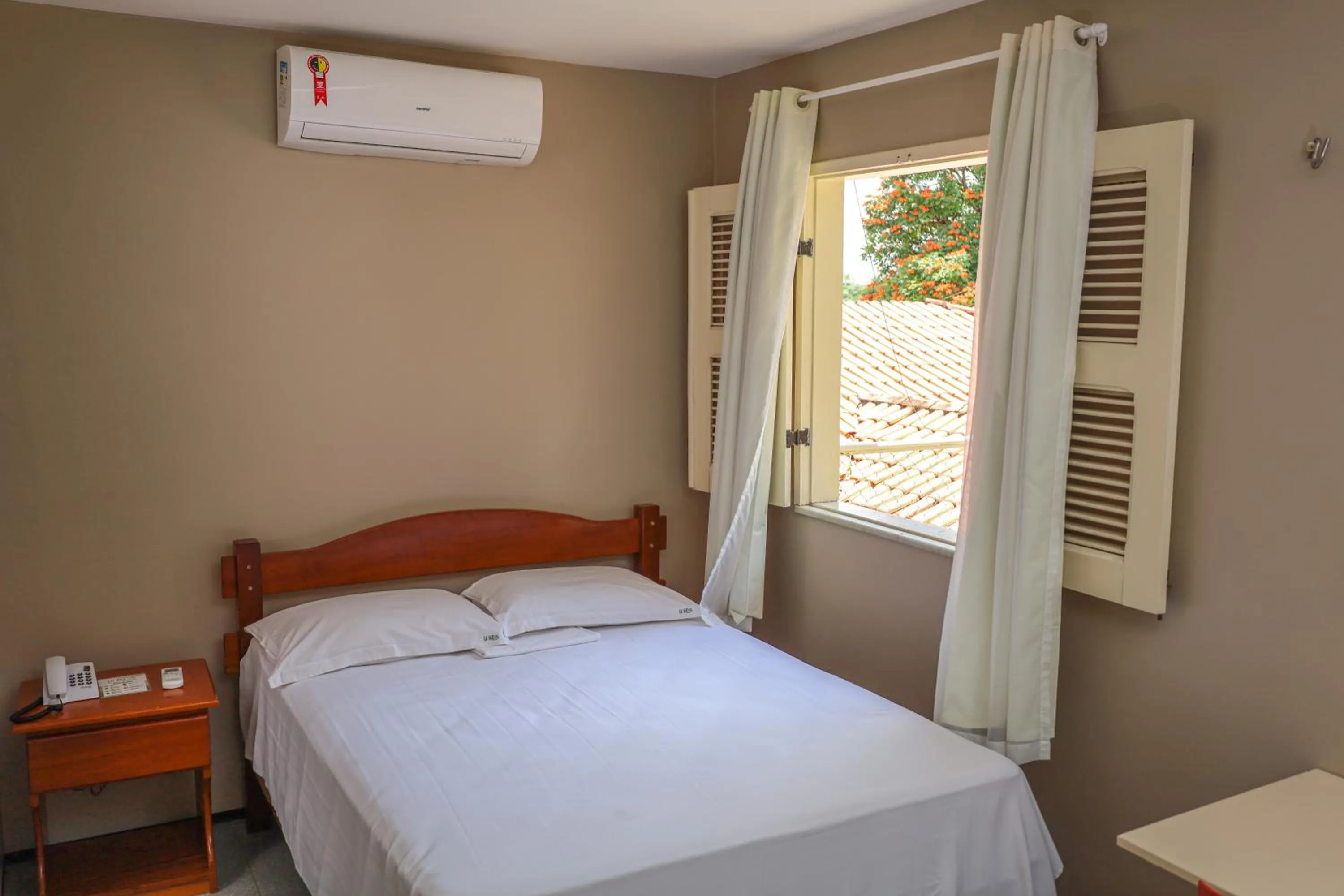 Bed in Le Rêve Pousada e Restaurante