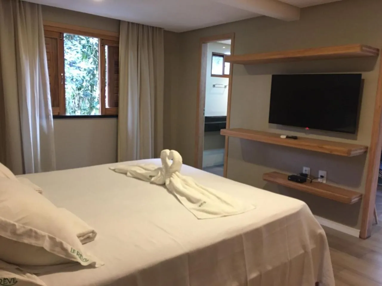 Bed in Le Rêve Pousada e Restaurante