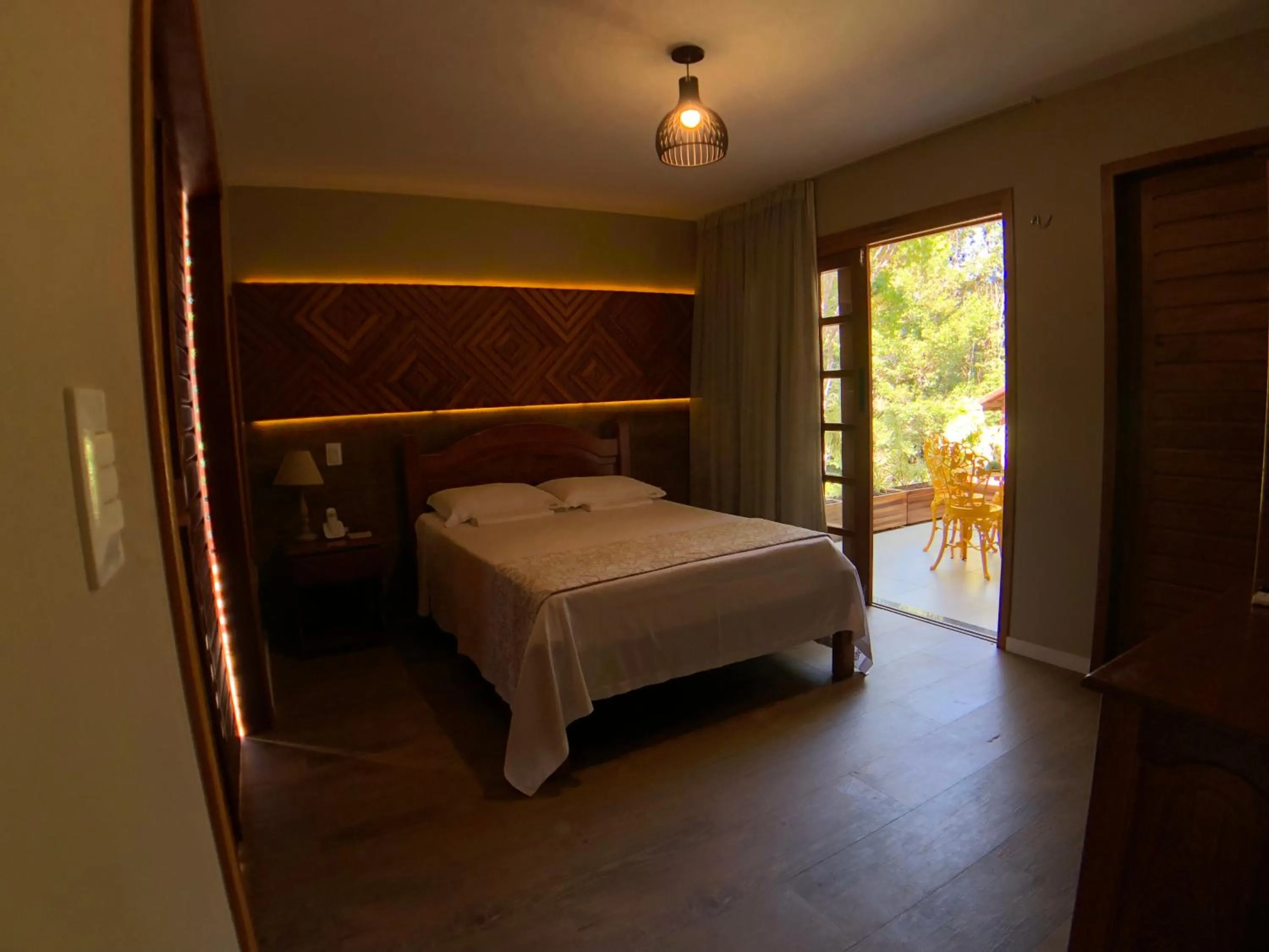 Bed in Le Rêve Pousada e Restaurante