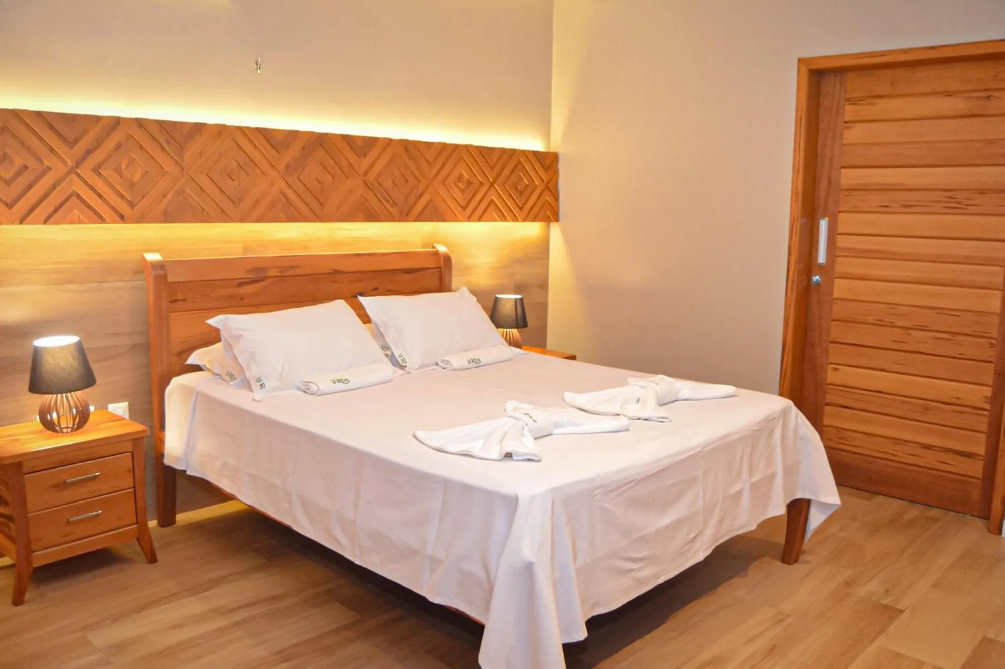 Bed in Le Rêve Pousada e Restaurante