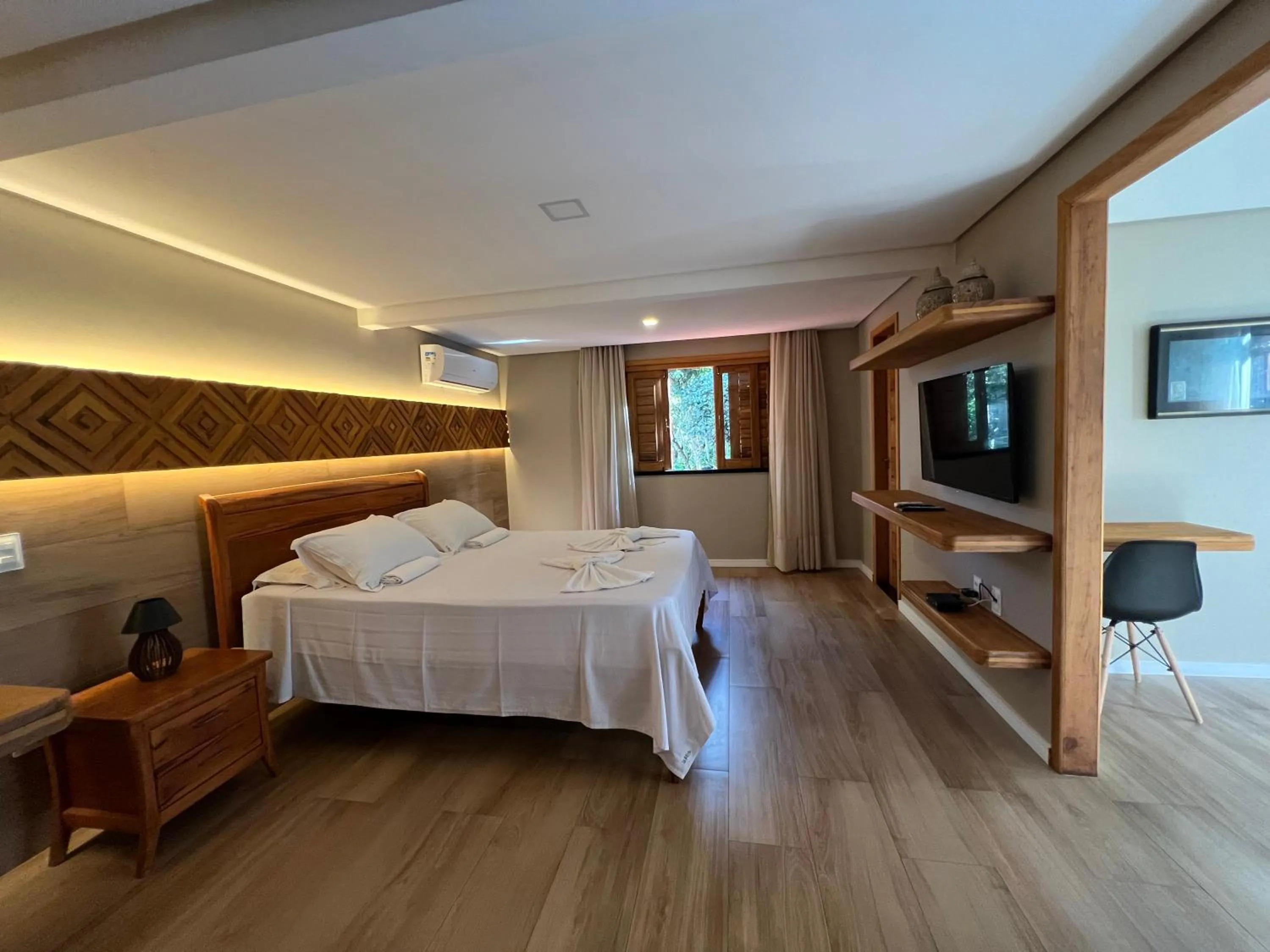 Bed in Le Rêve Pousada e Restaurante