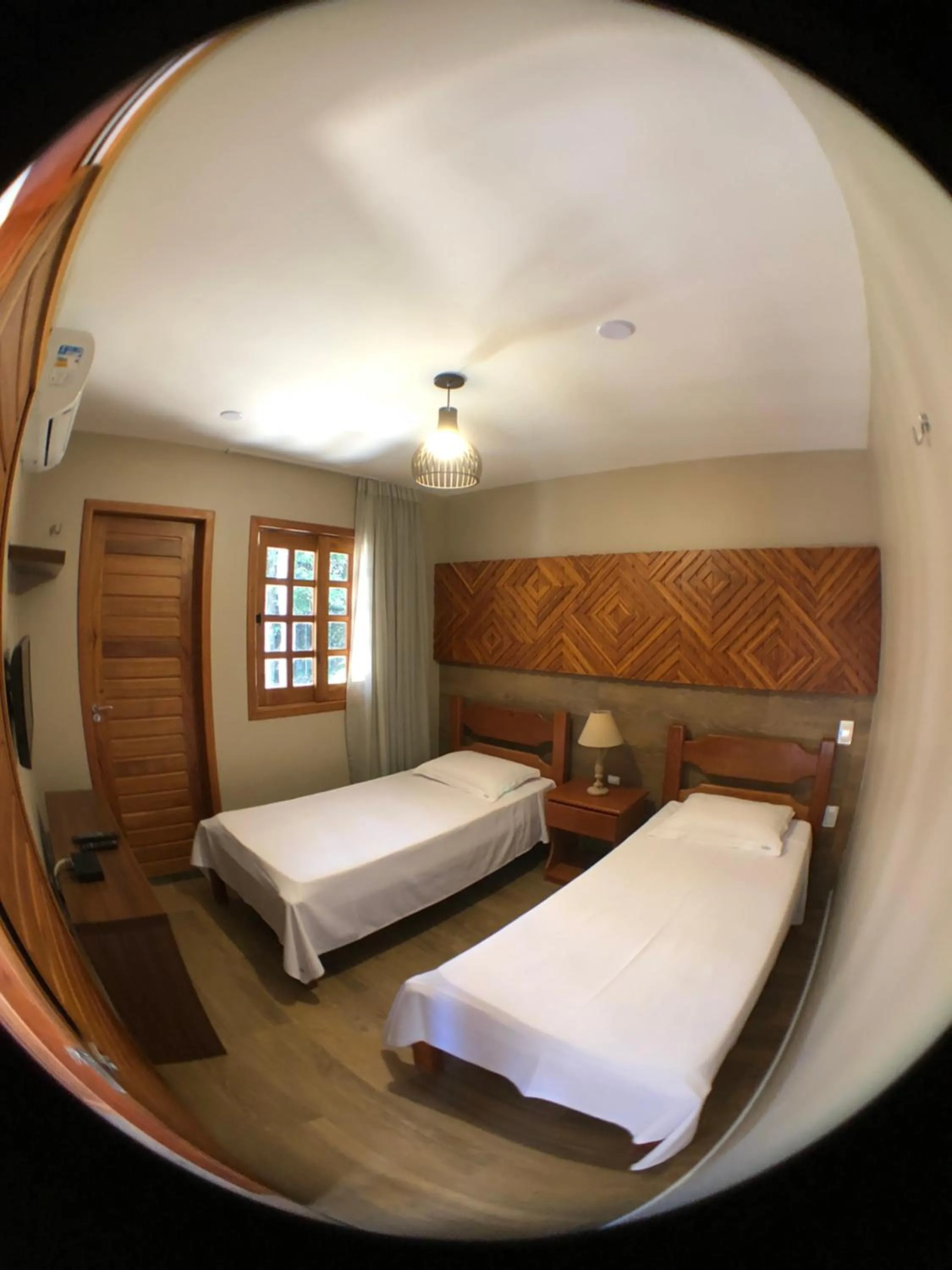 Bed in Le Rêve Pousada e Restaurante