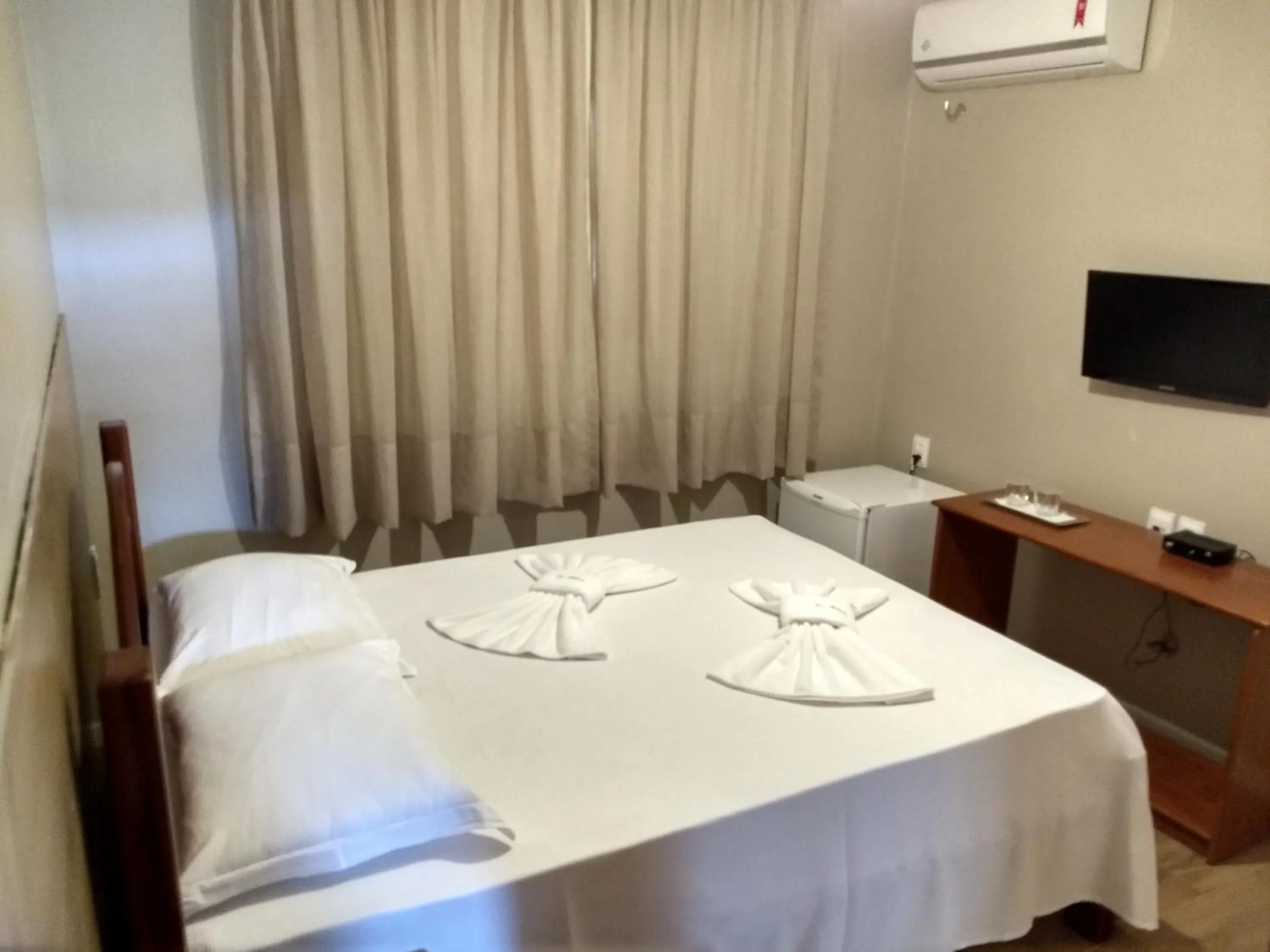 Bed in Le Rêve Pousada e Restaurante