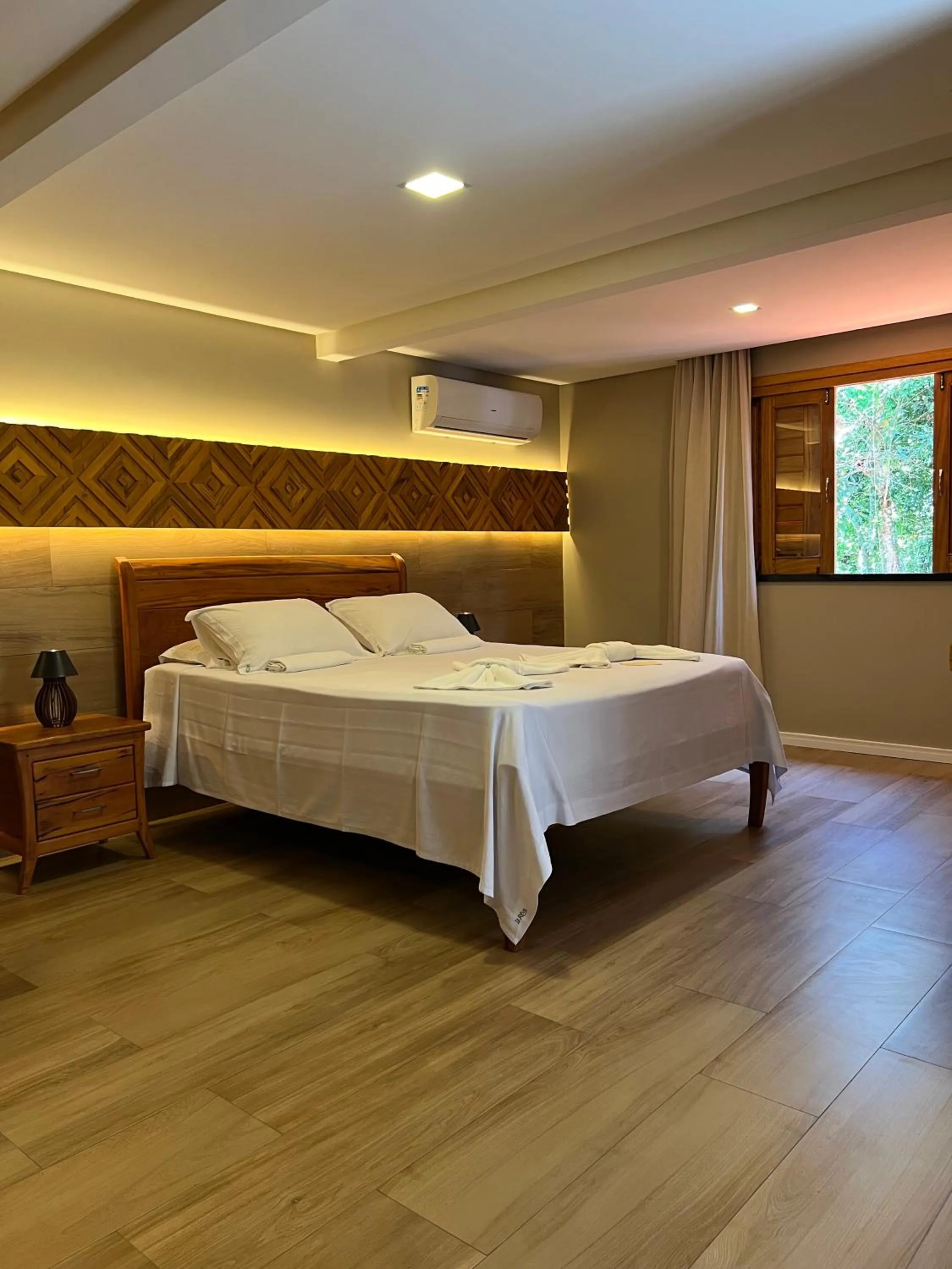 Bed in Le Rêve Pousada e Restaurante