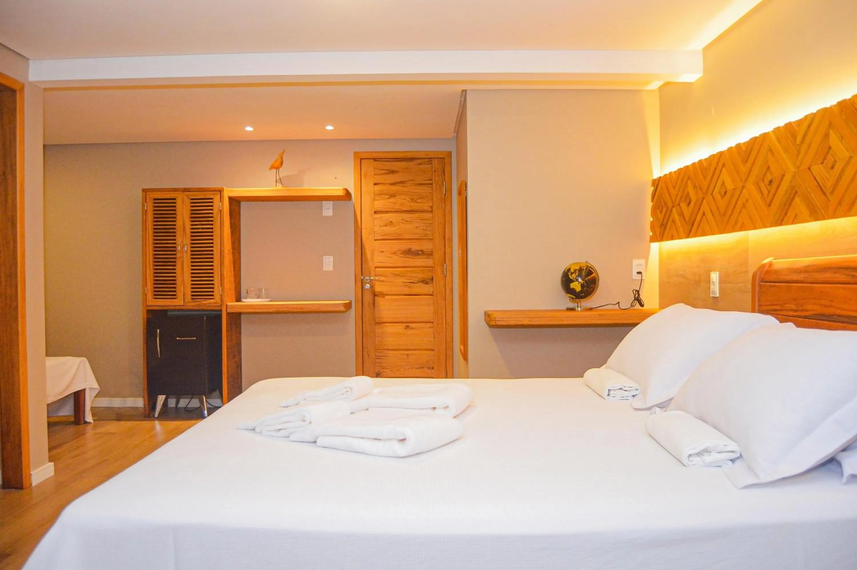 Bed in Le Rêve Pousada e Restaurante
