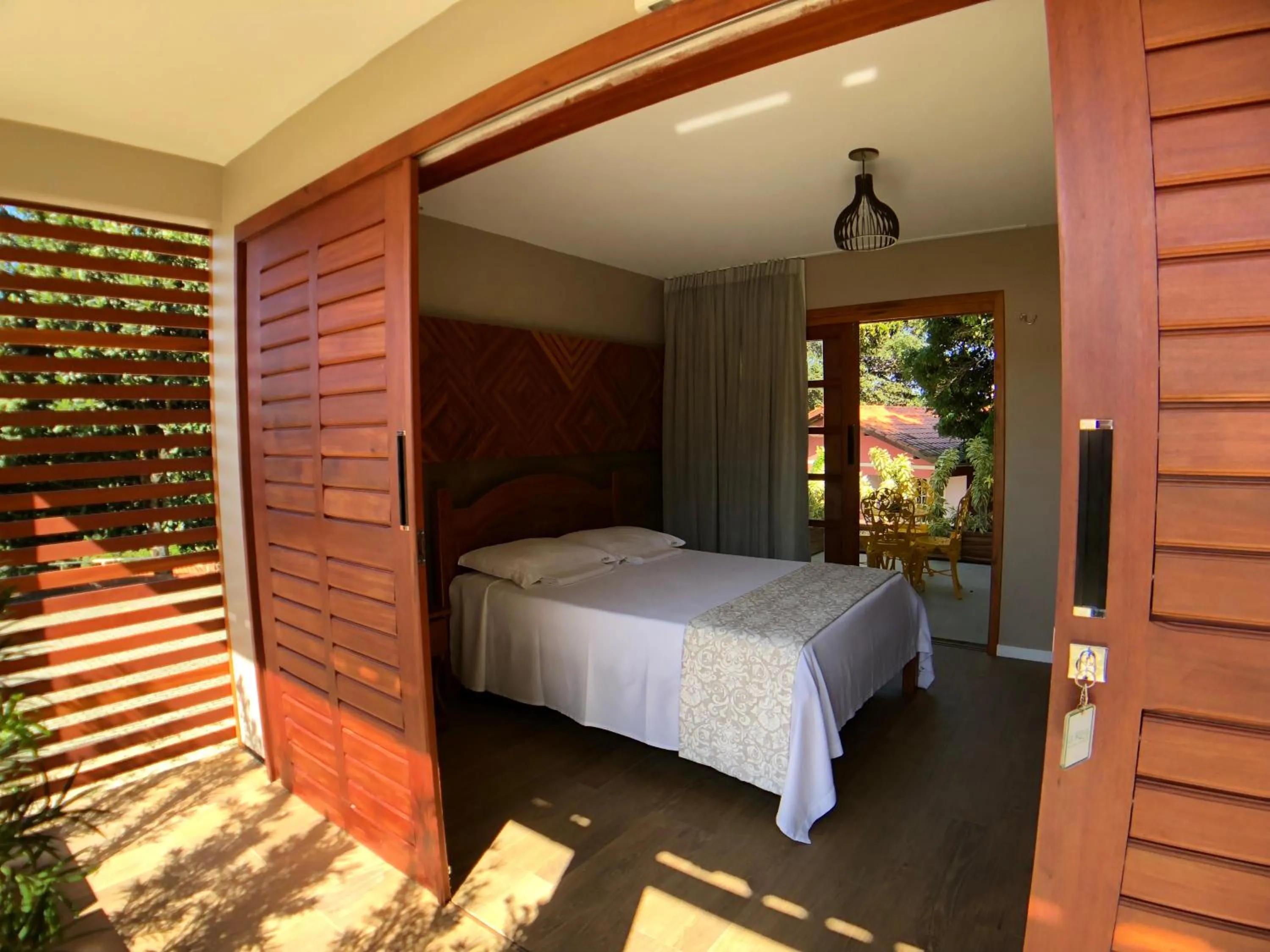 Bed in Le Rêve Pousada e Restaurante
