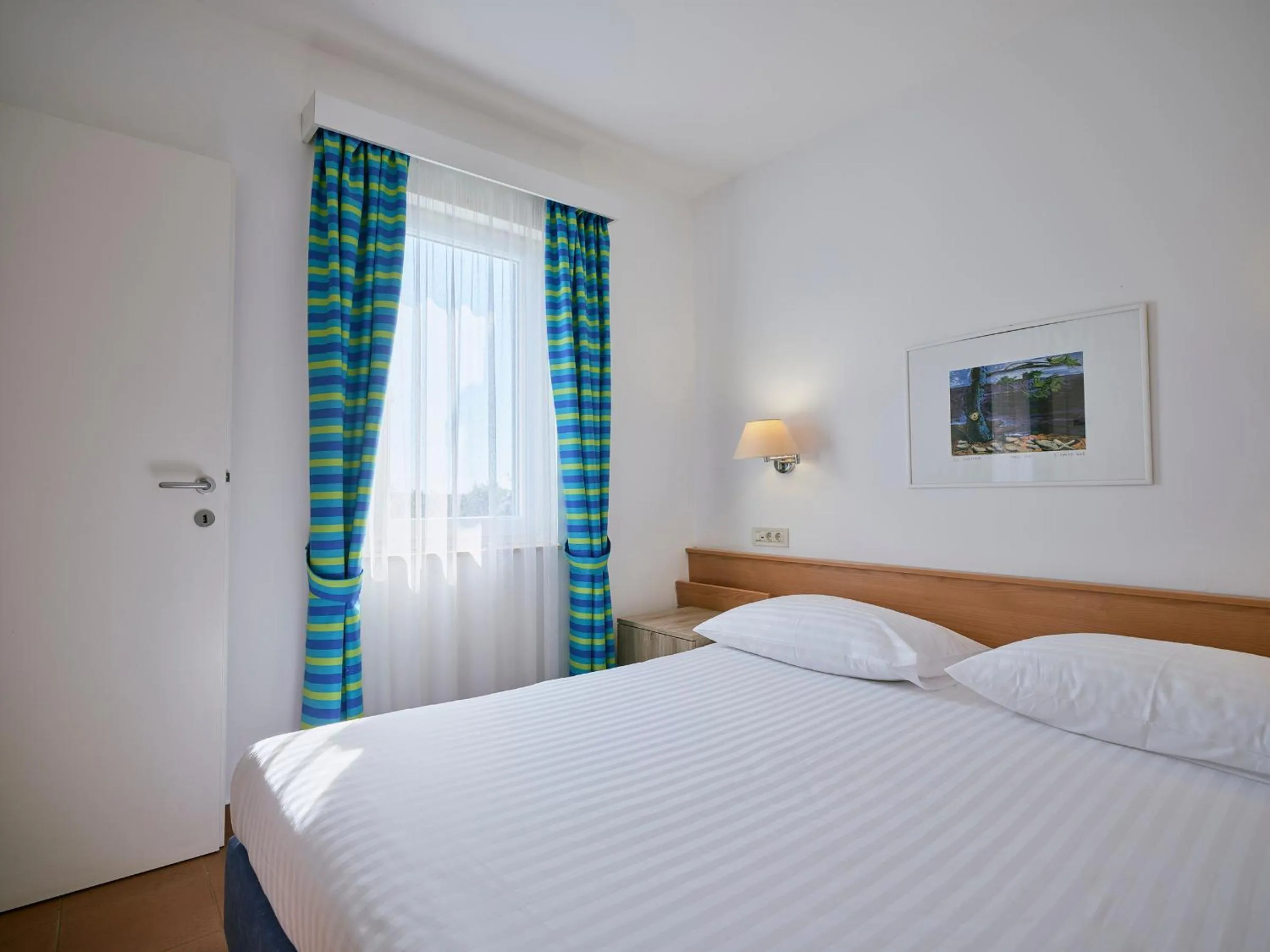 Bedroom, Bed in Koversada Apartments Naturist Park