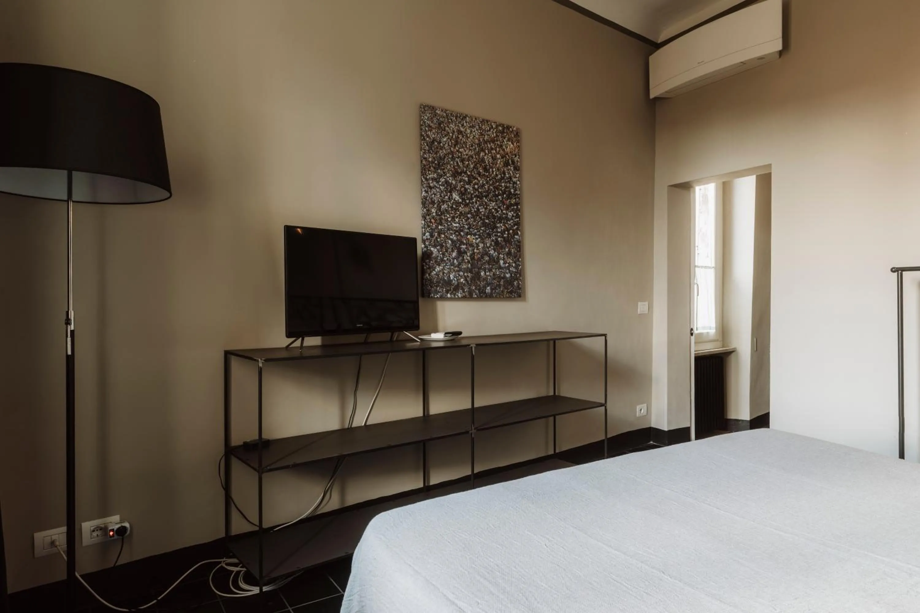 Communal lounge/ TV room, Bed in BirBo Bike Hospitality