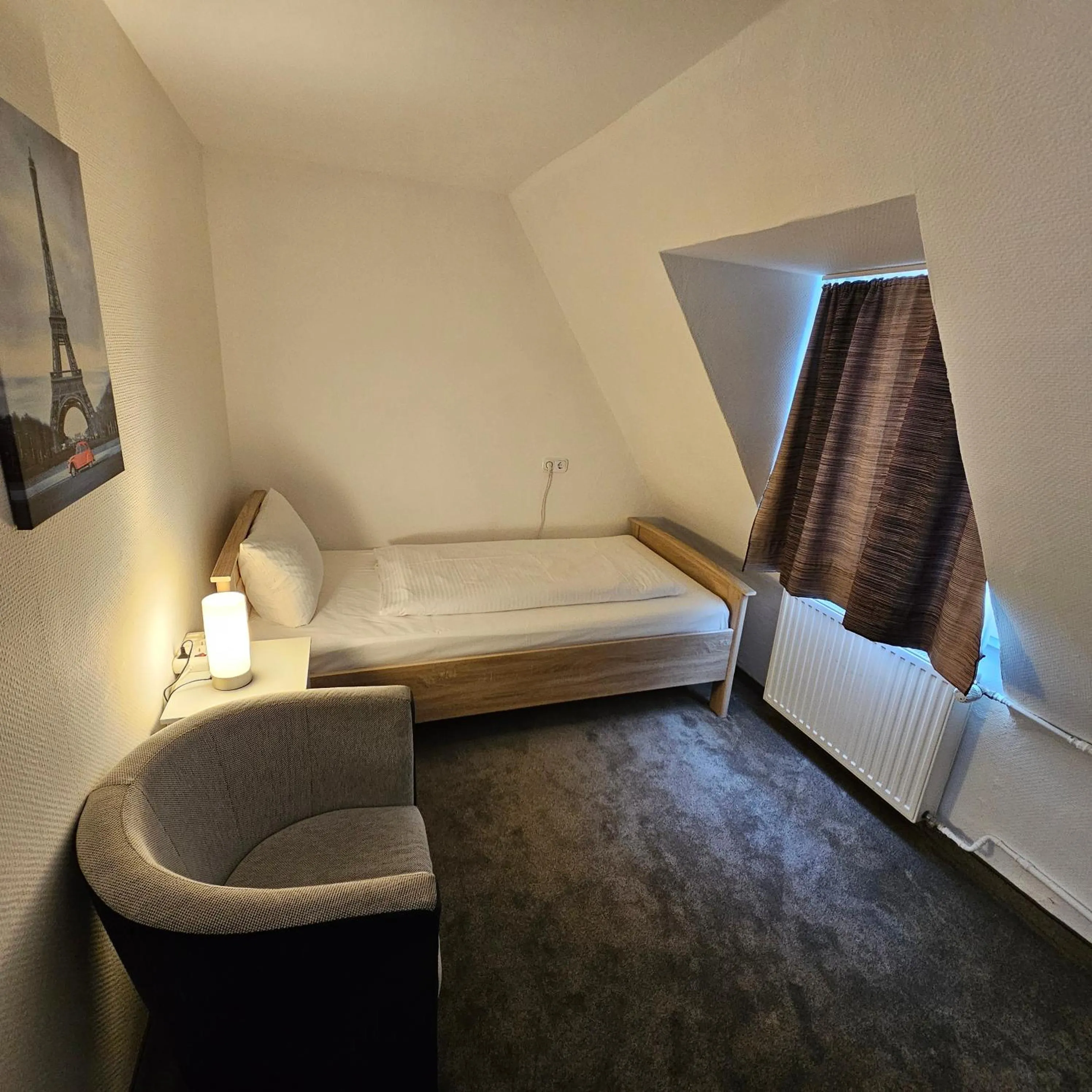 Bed in Hotel Kölner Hof
