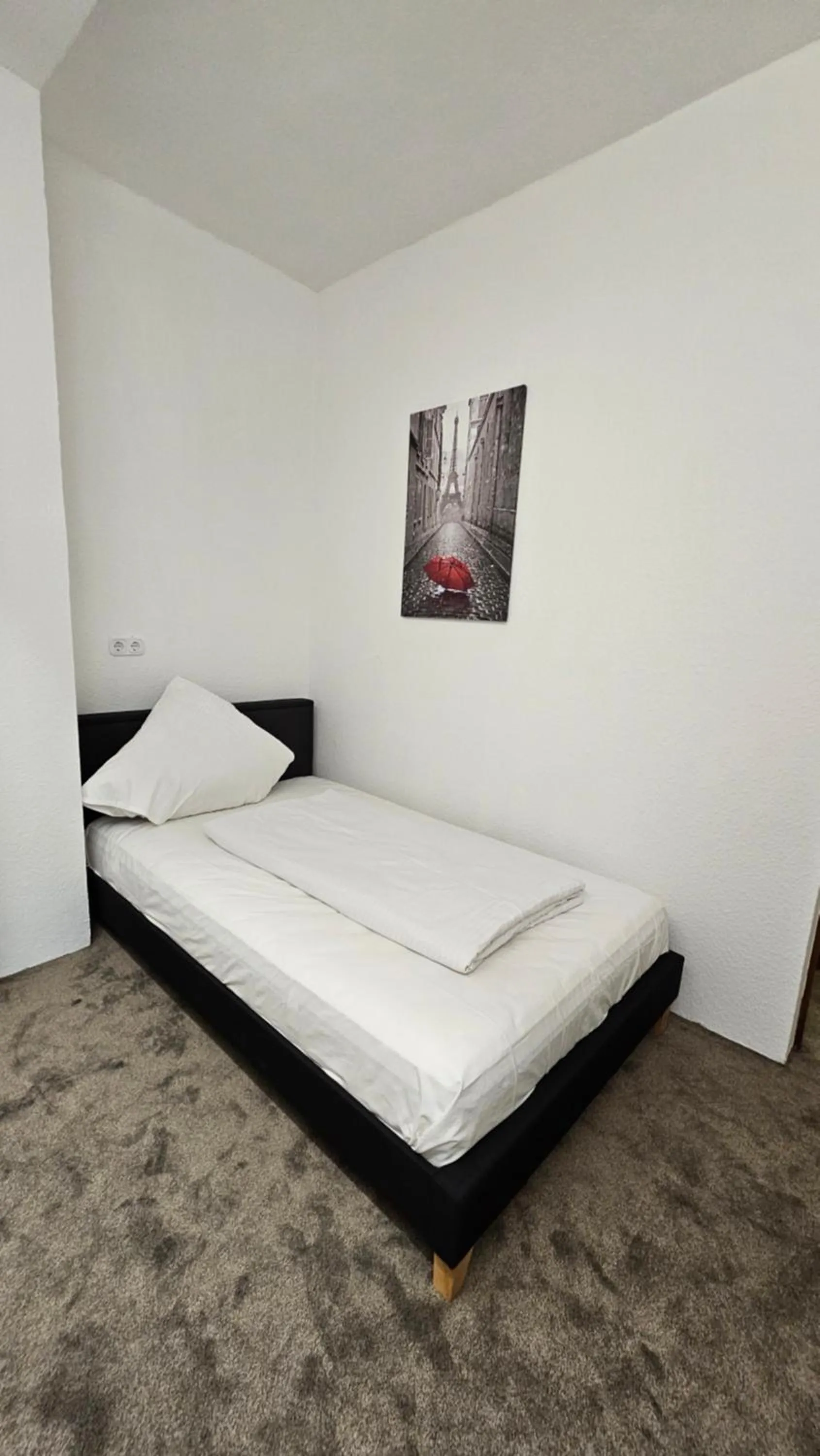 Bed in Hotel Kölner Hof