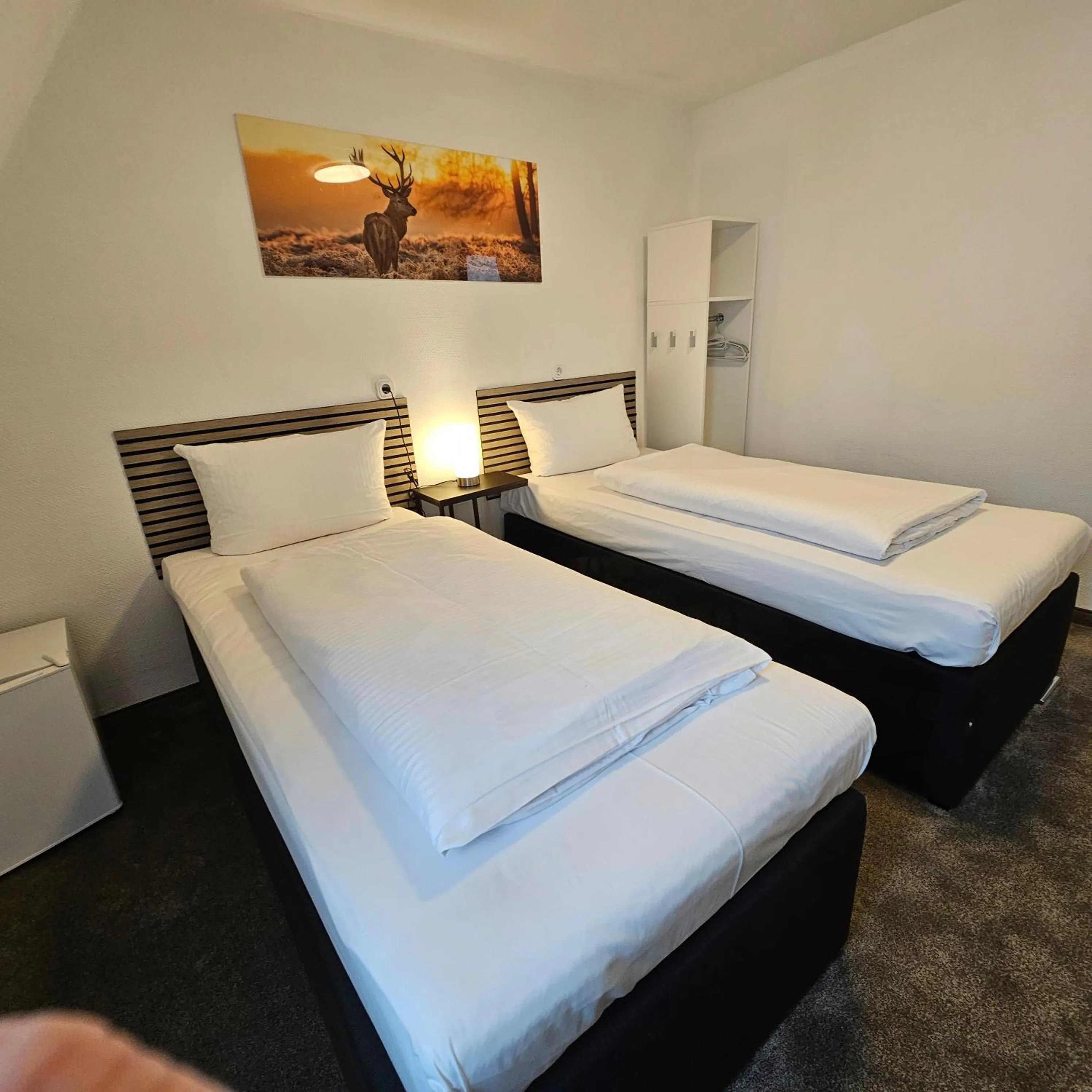 Bed in Hotel Kölner Hof