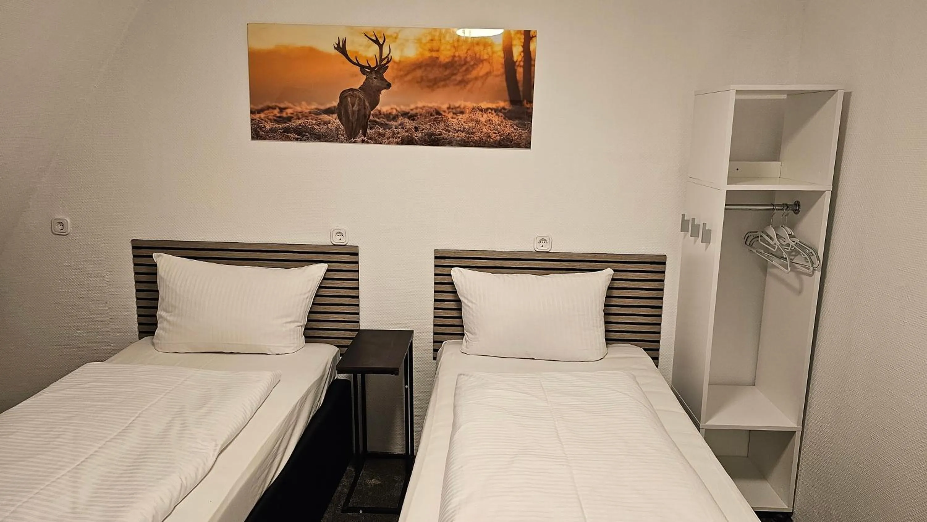 Bed in Hotel Kölner Hof