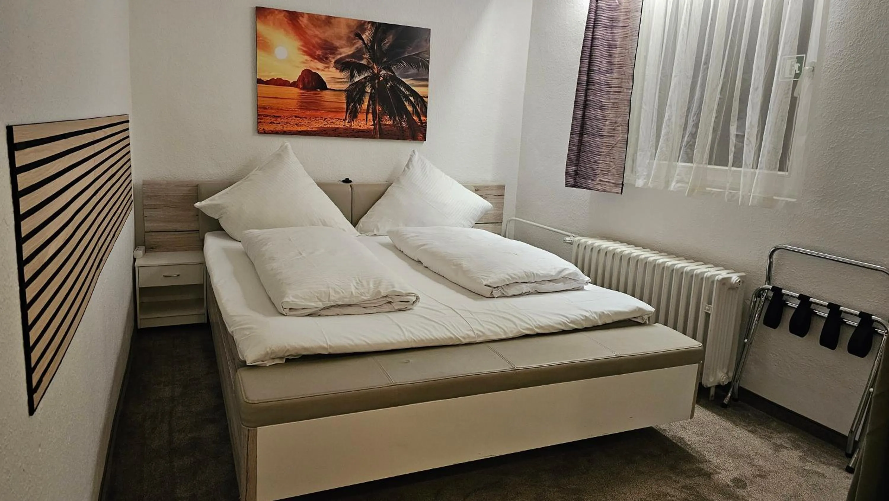 Bed in Hotel Kölner Hof