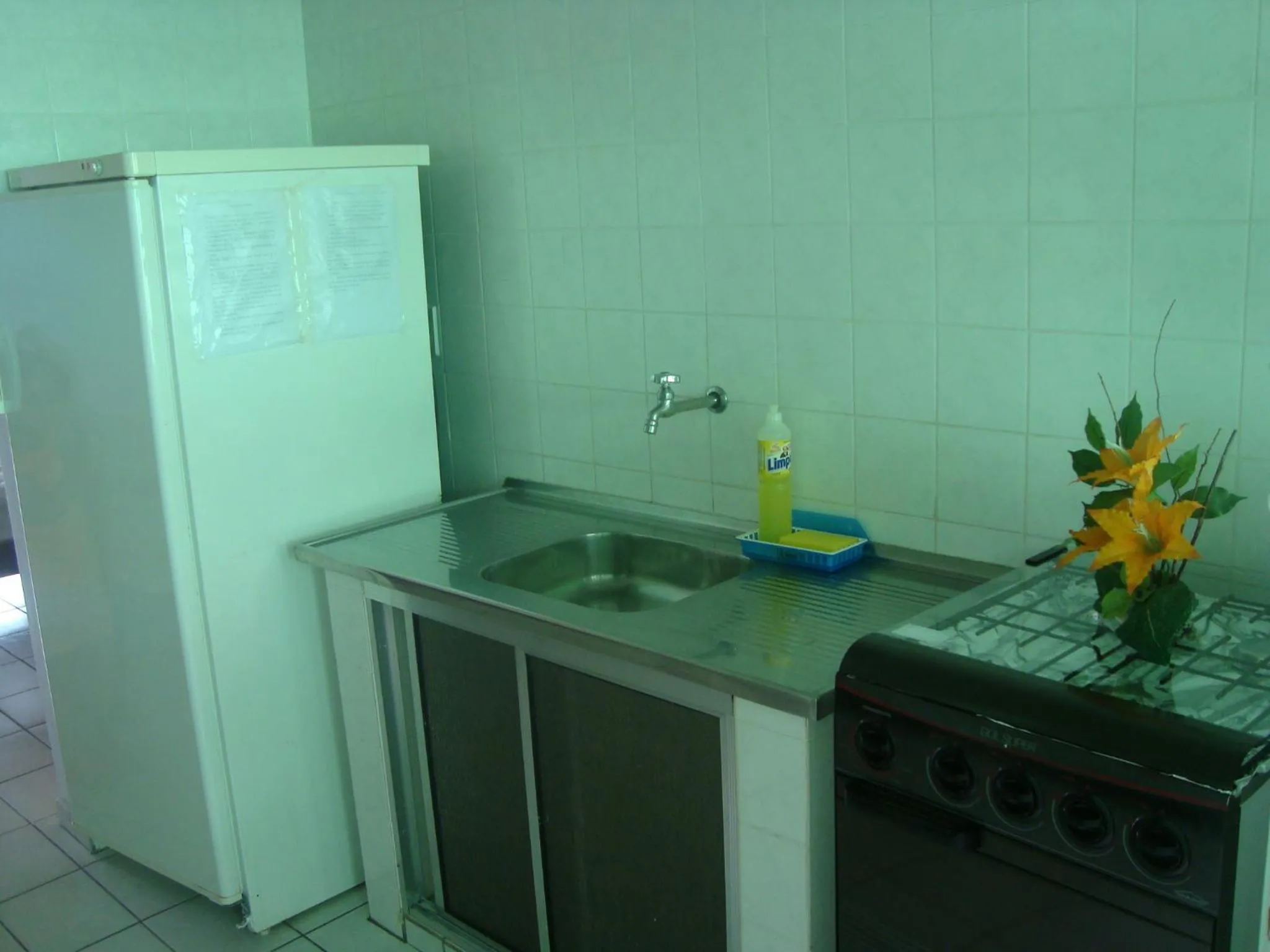 Kitchen or kitchenette in Marencanto Pousada