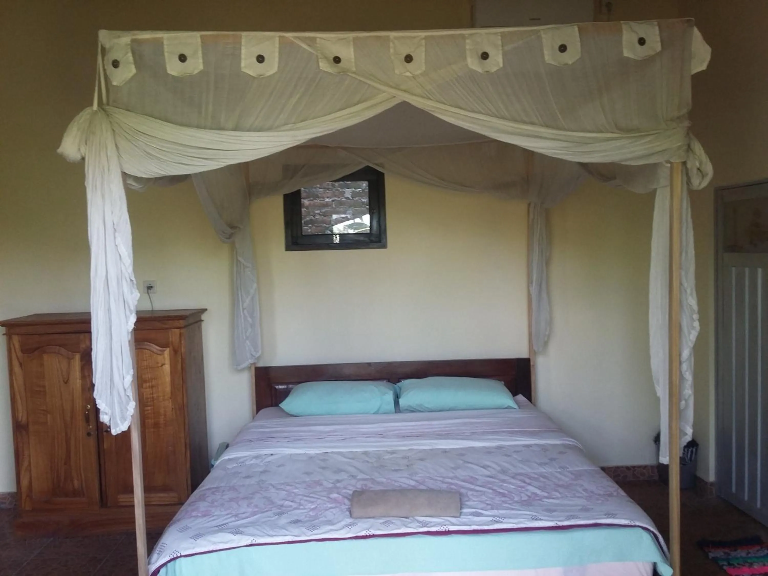 Property building, Bed in Surya Homestay