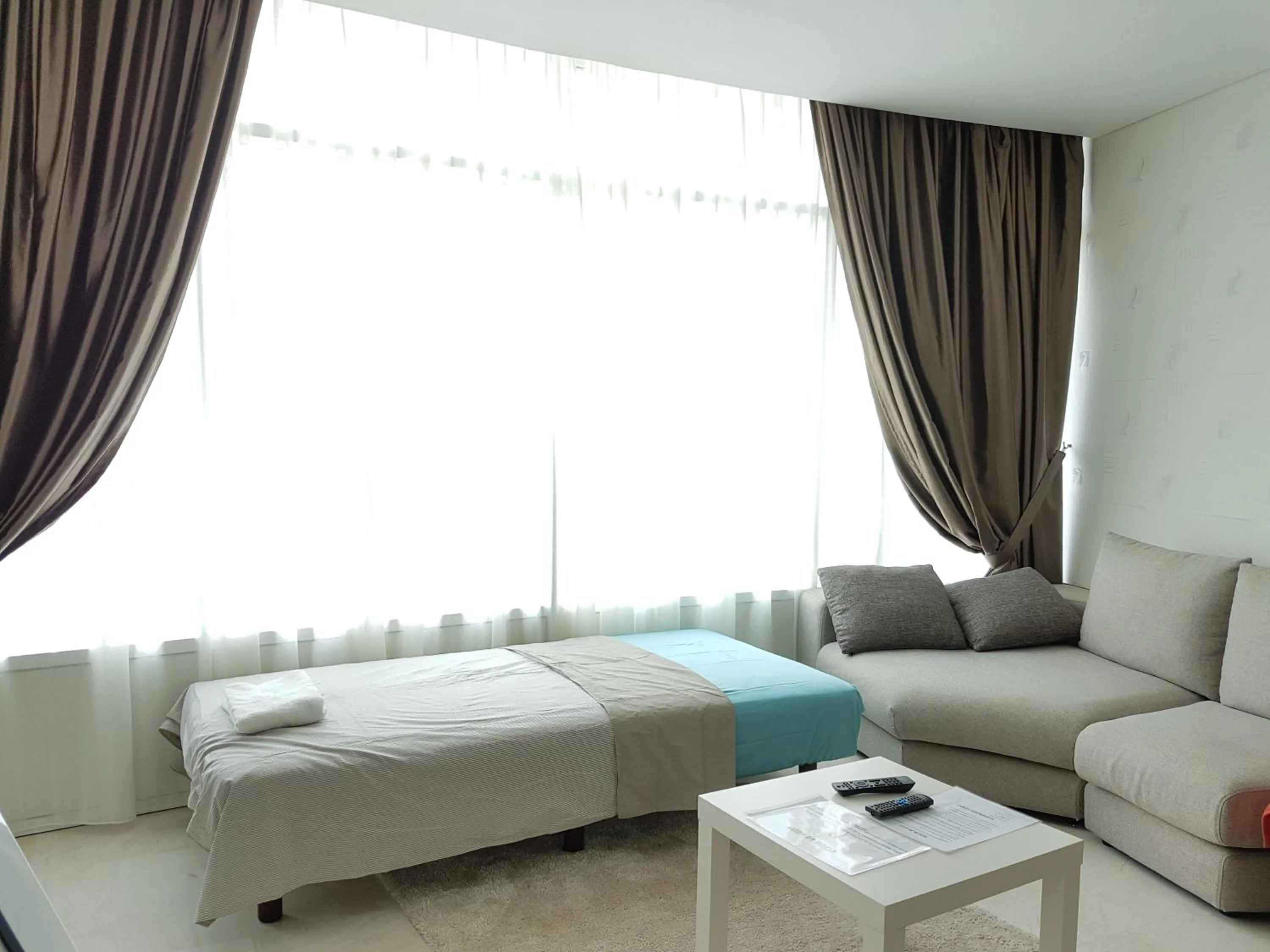 Living room, Bed in Vortex KLCC by Luxury Suites Asia