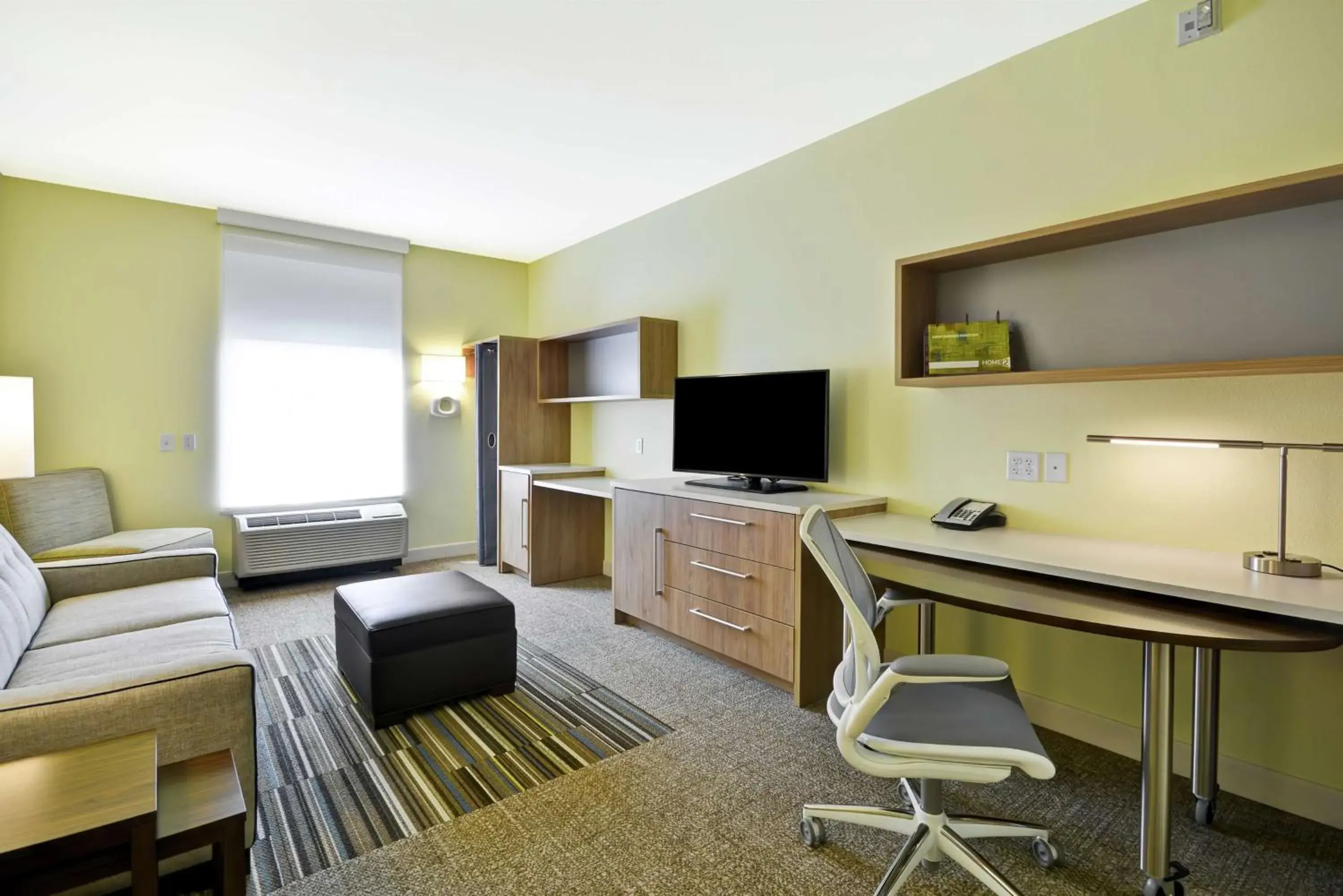 Living room in Home2 Suites By Hilton Dallas Addison Living room in Home2 Suites By Hilton Dallas Addison