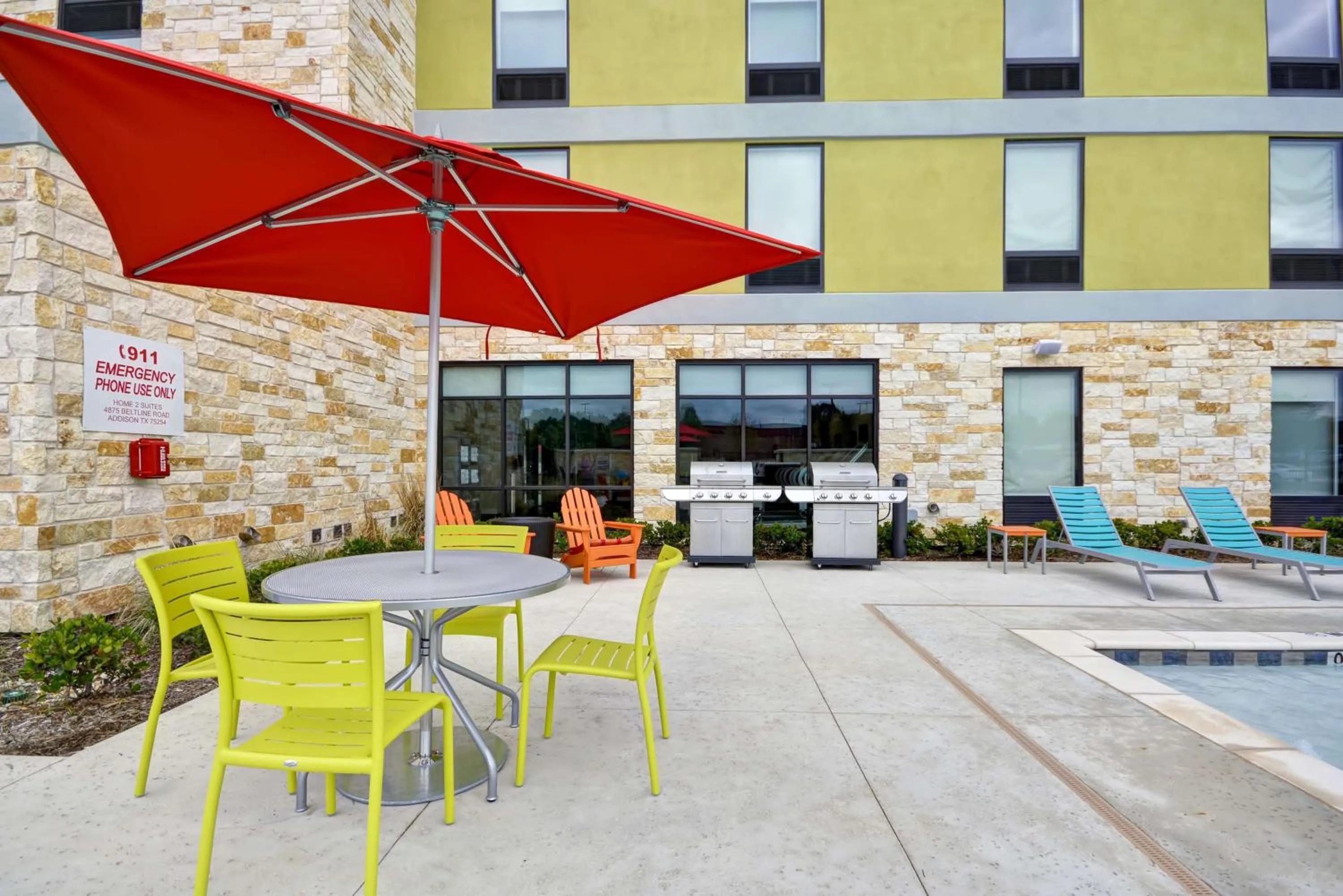 Pool view in Home2 Suites By Hilton Dallas Addison