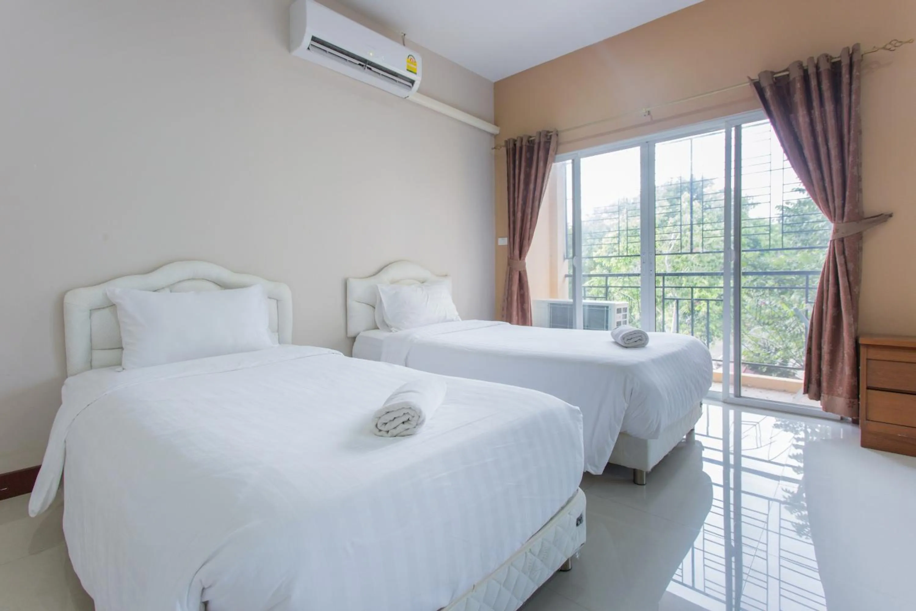 Bed in Grandsiri Resort KhaoYai