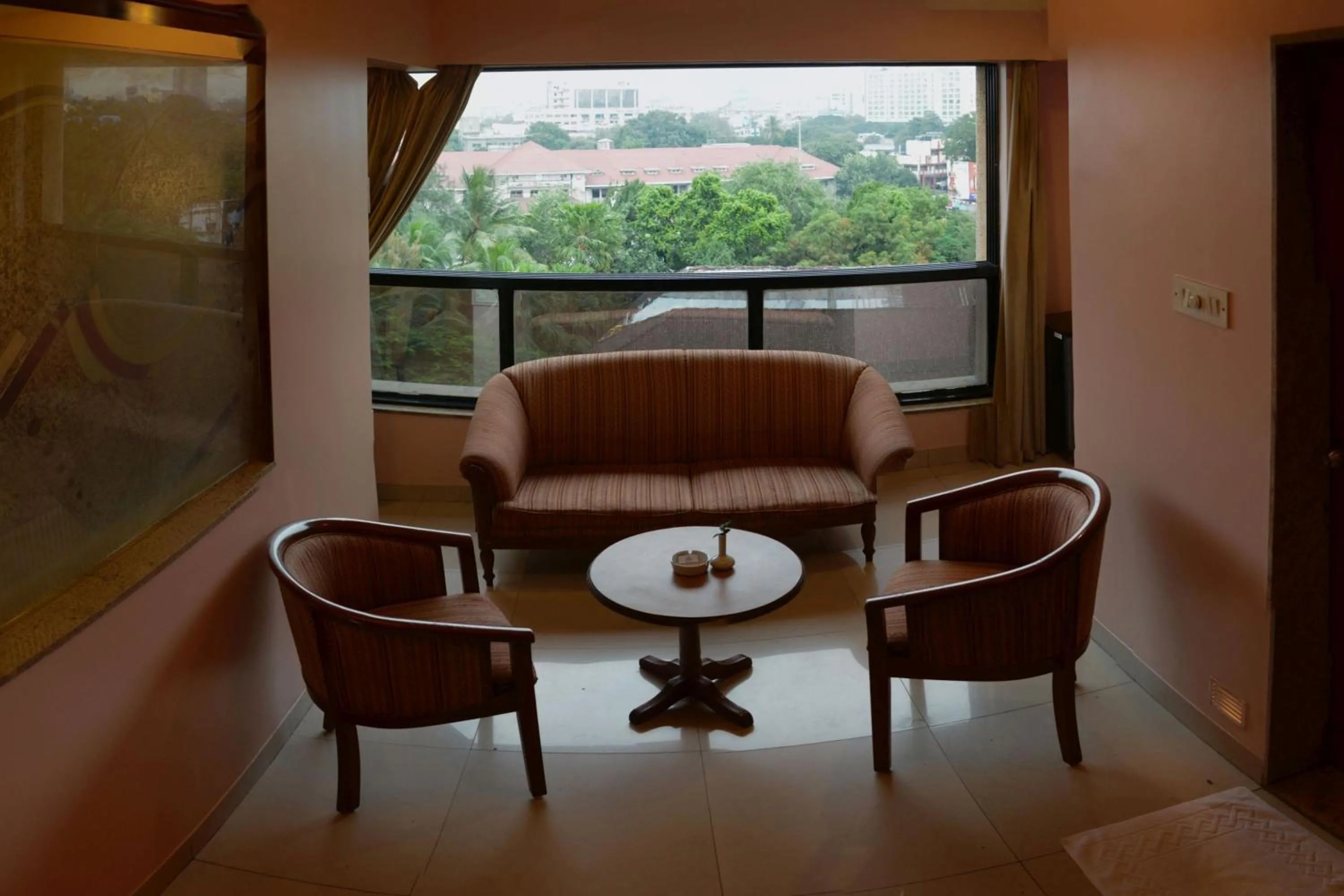 Seating area in The Samrat Hotel near Pune Railway Station