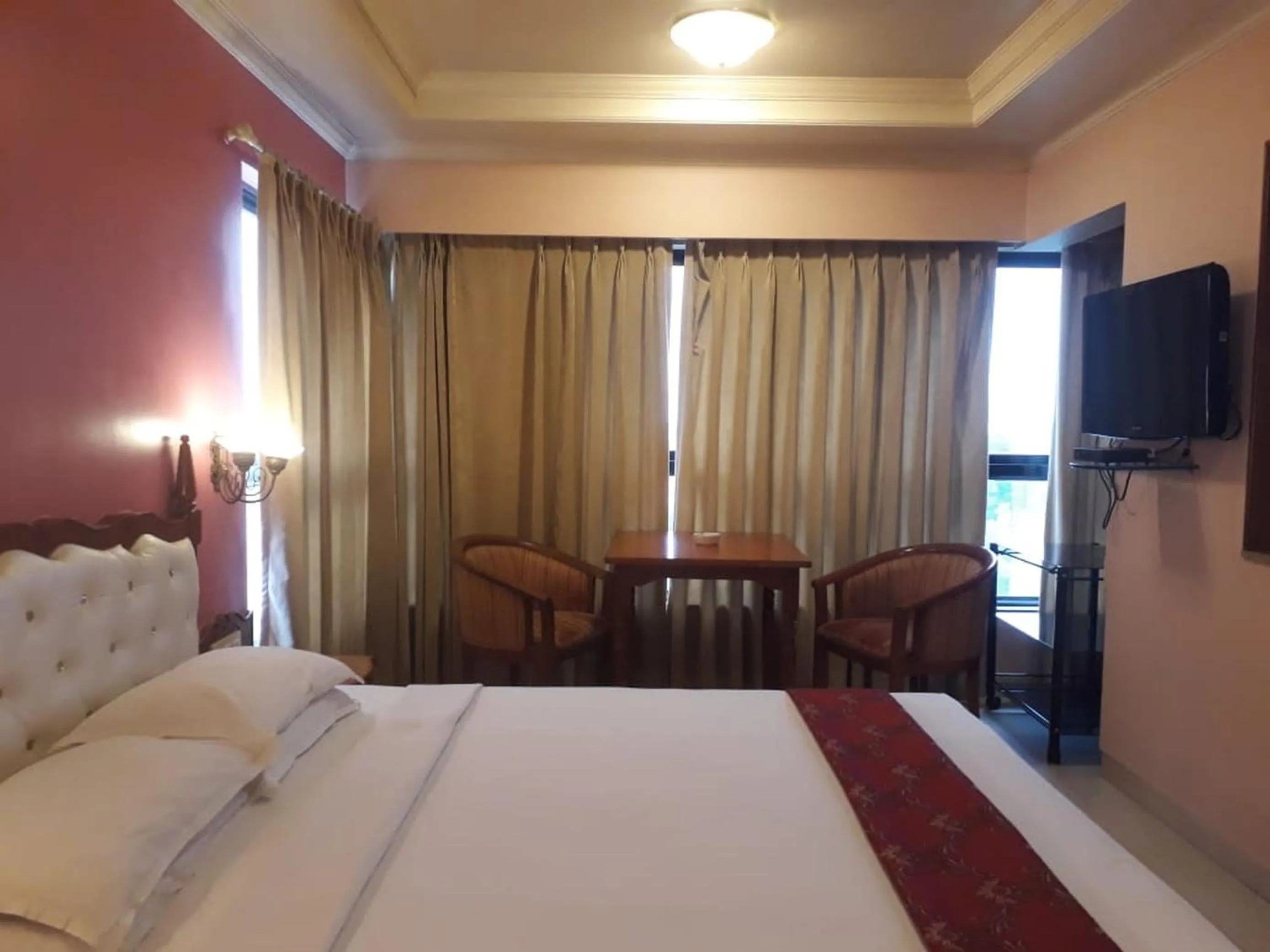 Bedroom, Bed in The Samrat Hotel near Pune Railway Station