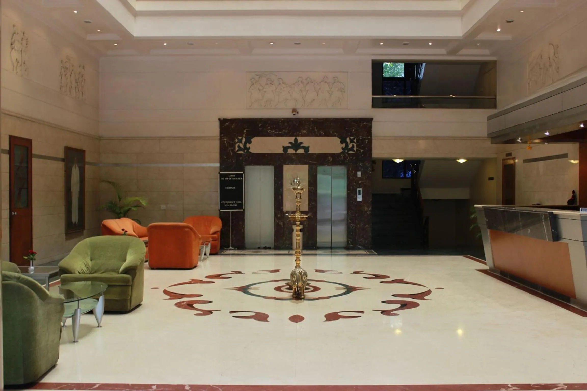 Lobby or reception in The Samrat Hotel near Pune Railway Station