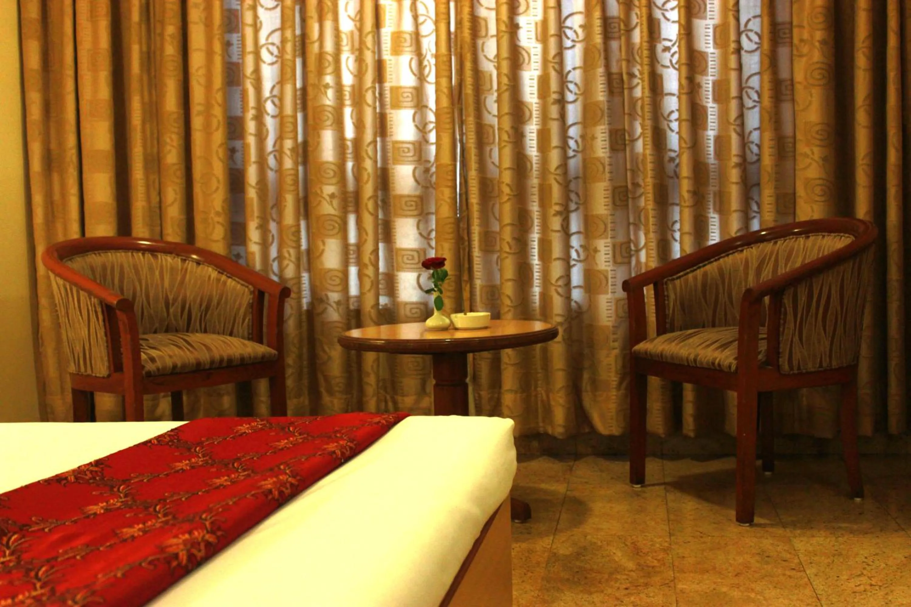 Bedroom in The Samrat Hotel near Pune Railway Station