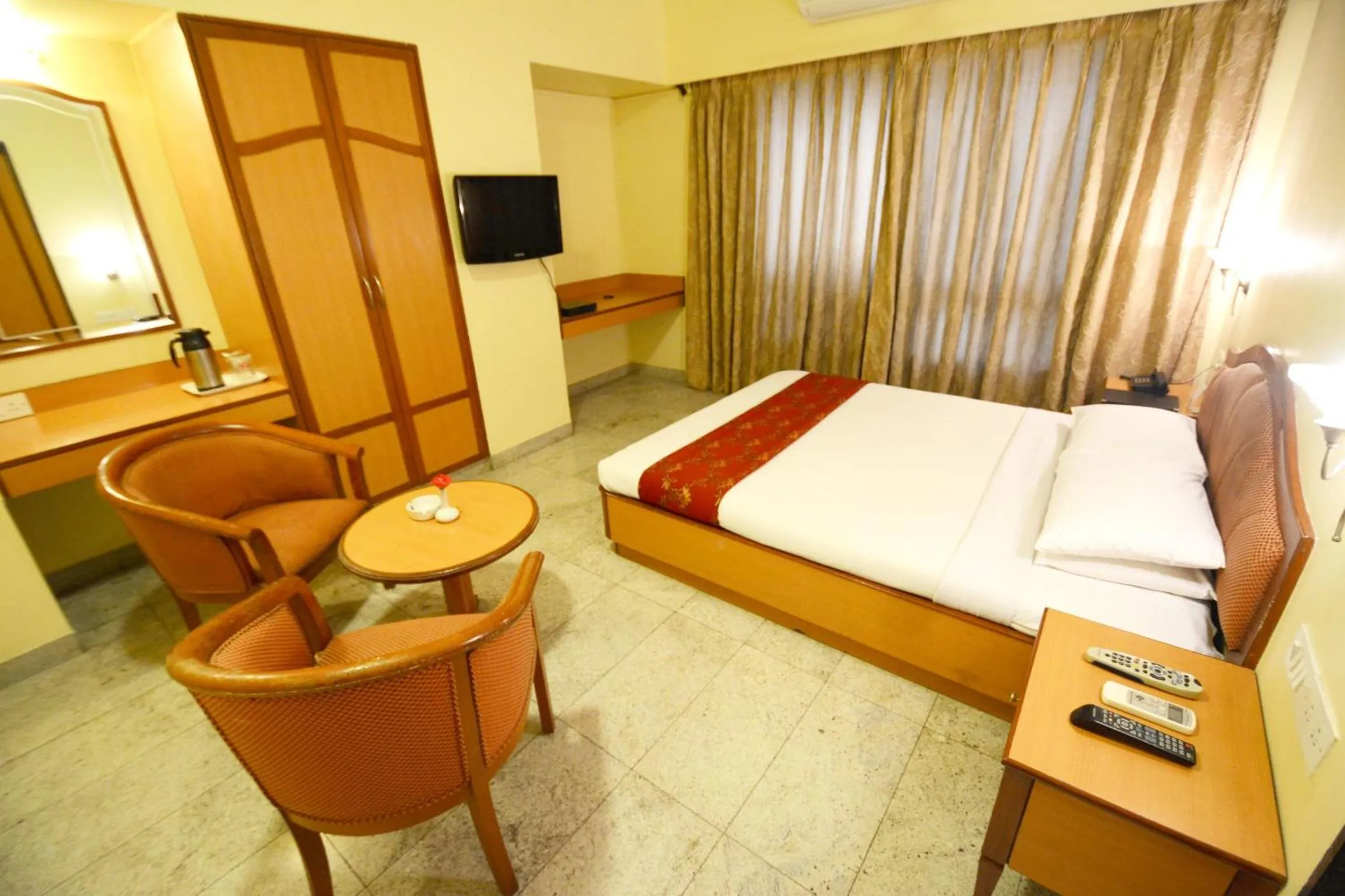 Bedroom, Bed in The Samrat Hotel near Pune Railway Station