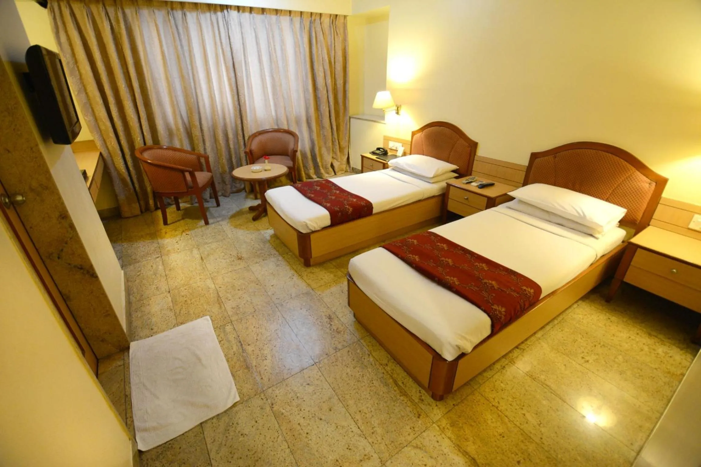 Bedroom, Bed in The Samrat Hotel near Pune Railway Station