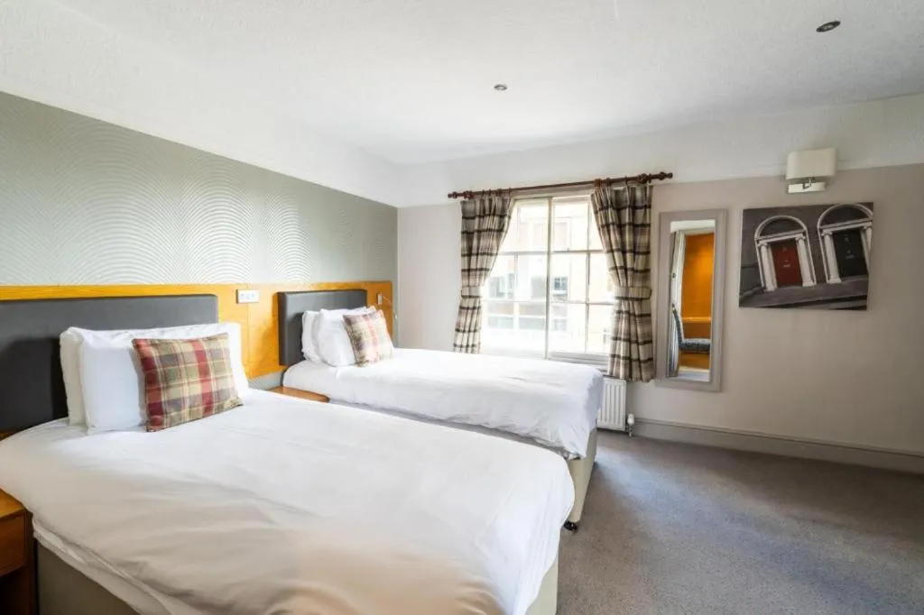 Bedroom, Bed in OYO The Red Lion Hotel